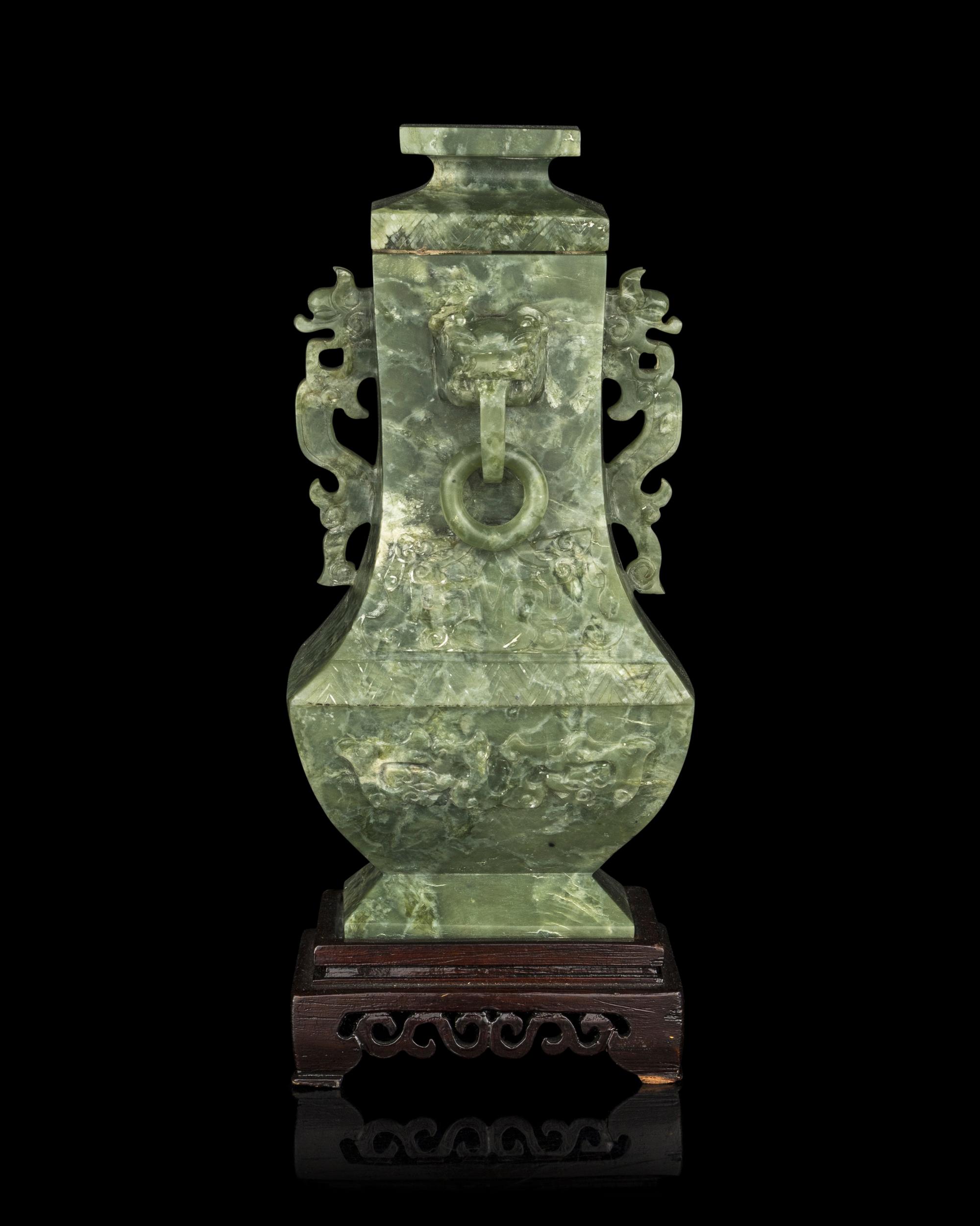 A Chinese Archaistic Green Hardstone Vase and Cover