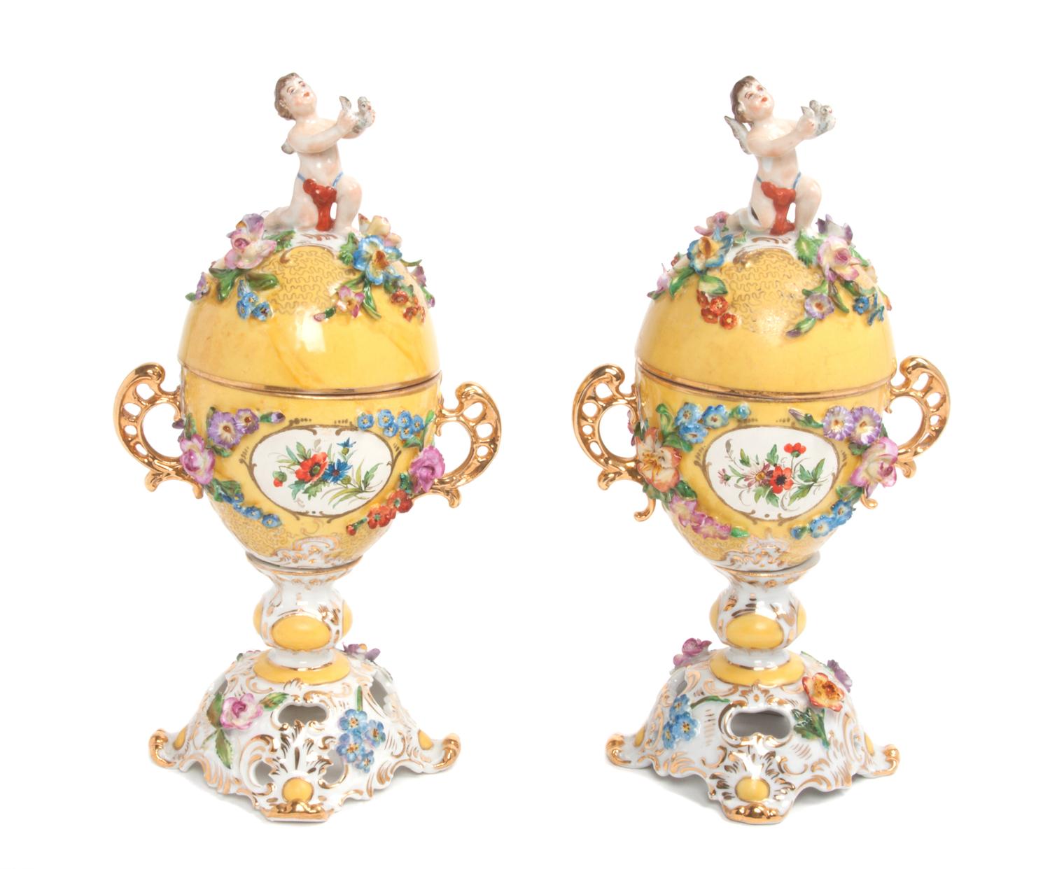 A Pair of Royal Vienna Covered Urns Height 9 1/4 inches.