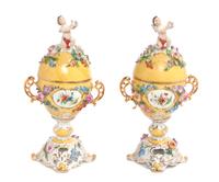 A Pair of Royal Vienna Covered Urns Height 9 1/4 inches.