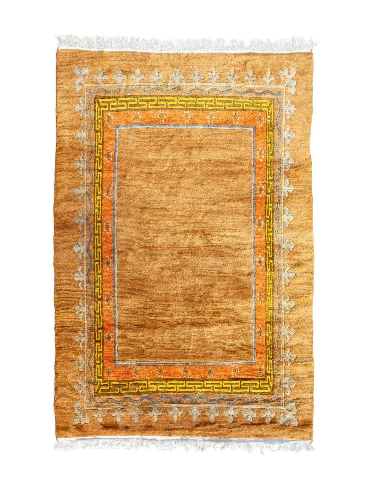 A Chinese Wool Rug — 20TH CENTURY
