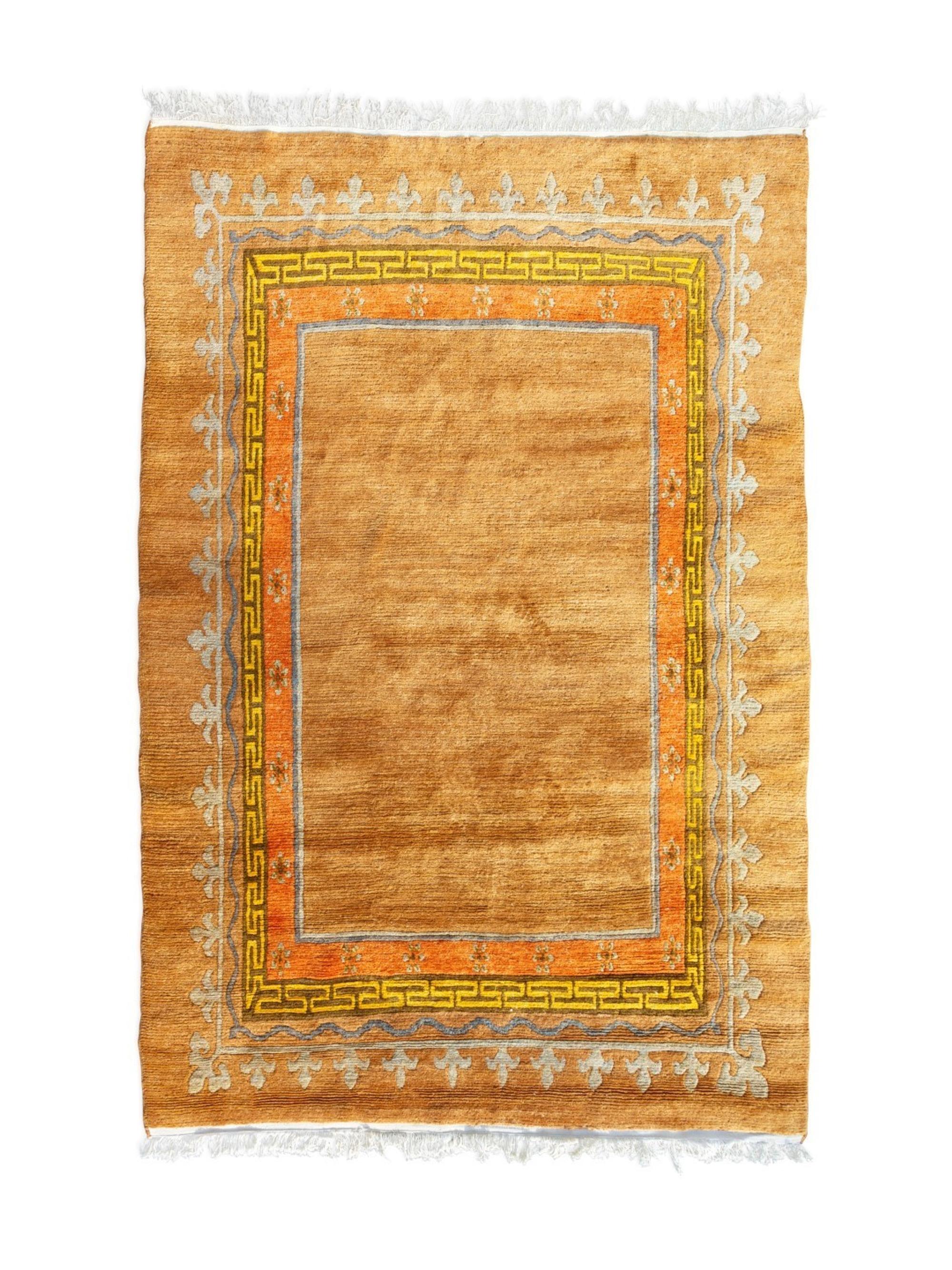 A Chinese Wool Rug — 20TH CENTURY