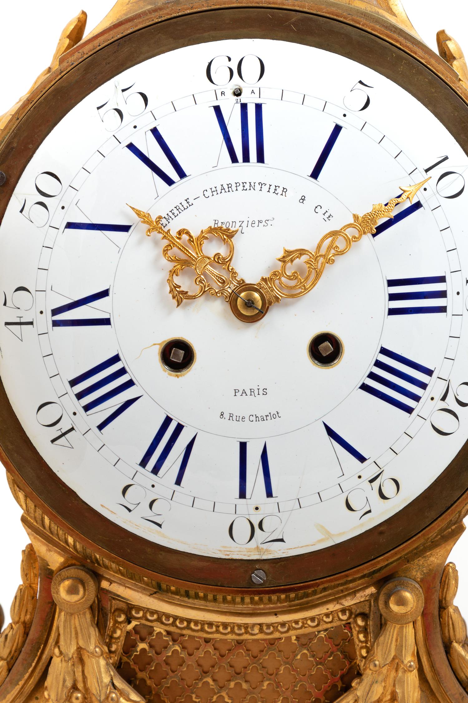 A Napoleon III Gilt Bronze Clock Garniture