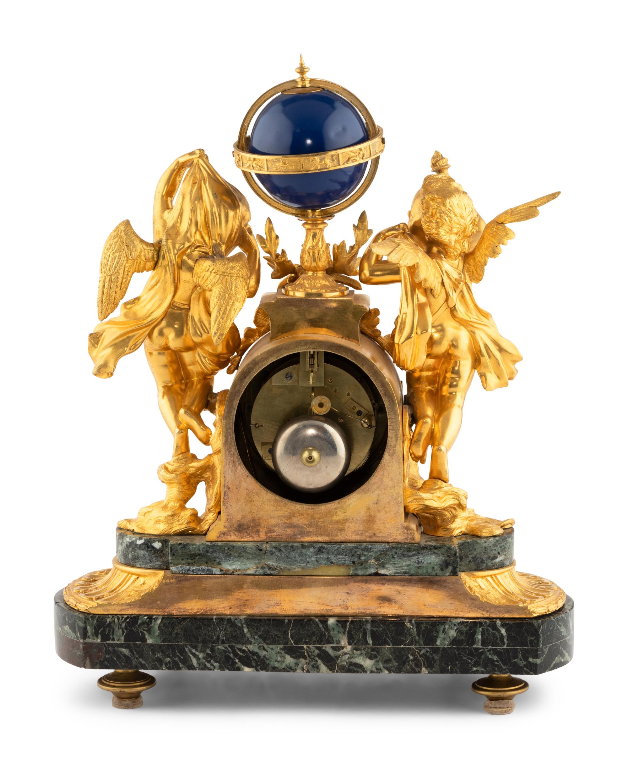 A Continental Gilt Bronze and Marble Figural Mantel Clock