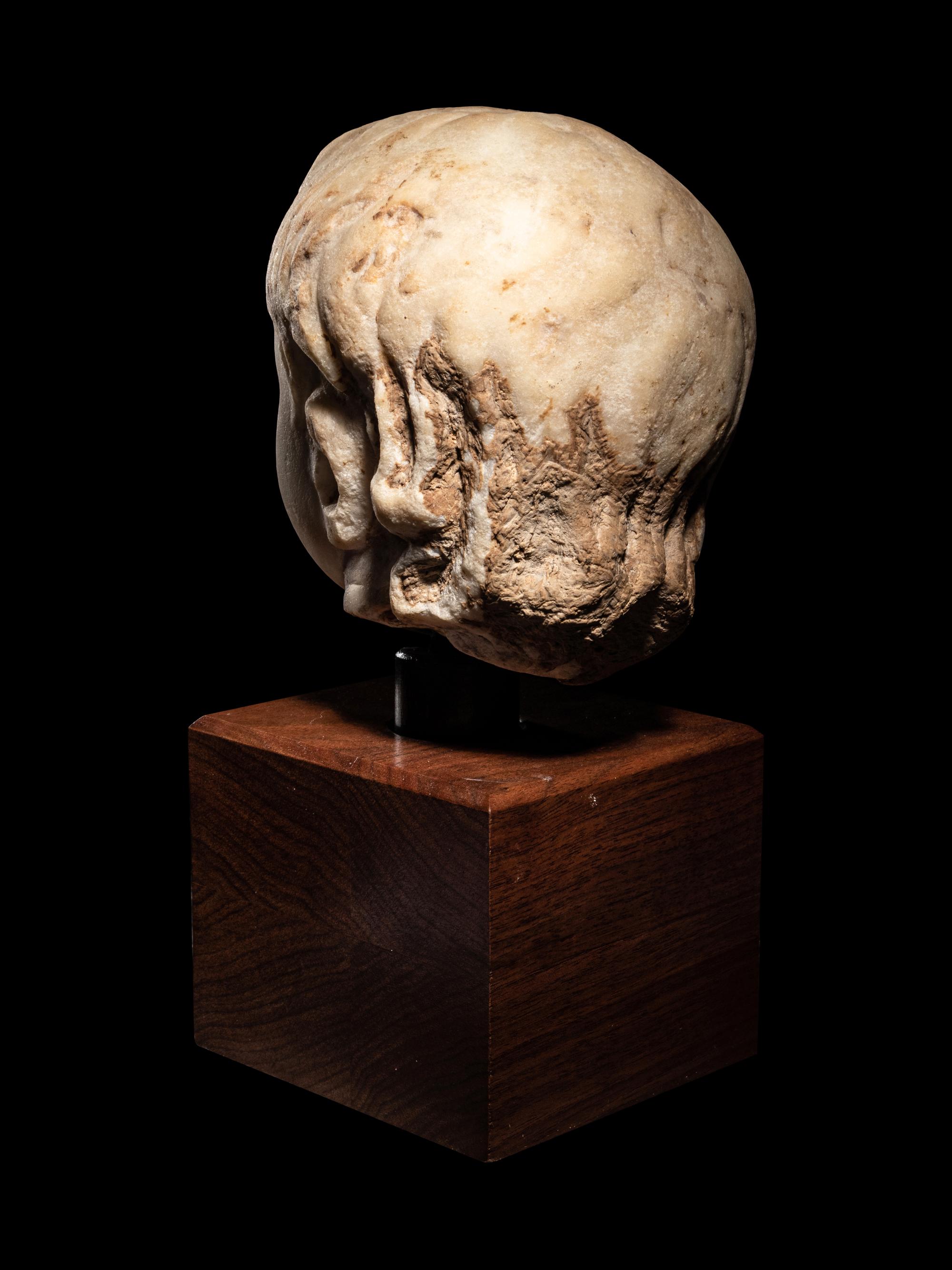 A Roman Marble Portrait Head of Eros
