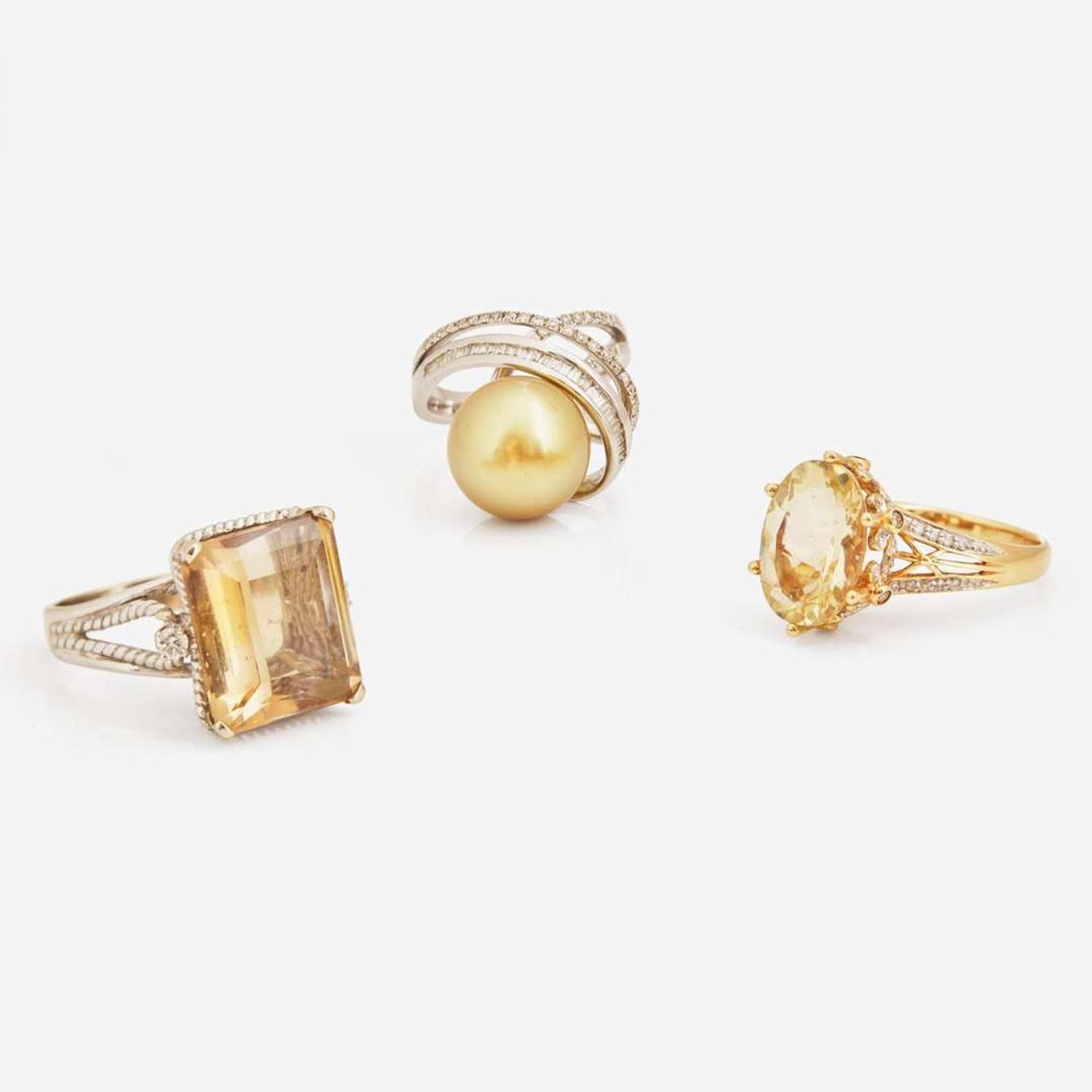 A Collection of Three Contemporary Gold and Gemstone Rings