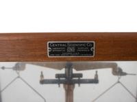 A Central Scientific Co. Scale, an Ingraham Eight-Day Movement Mantle Clock and Framed Salesmen Samples of Blue Grass Axes