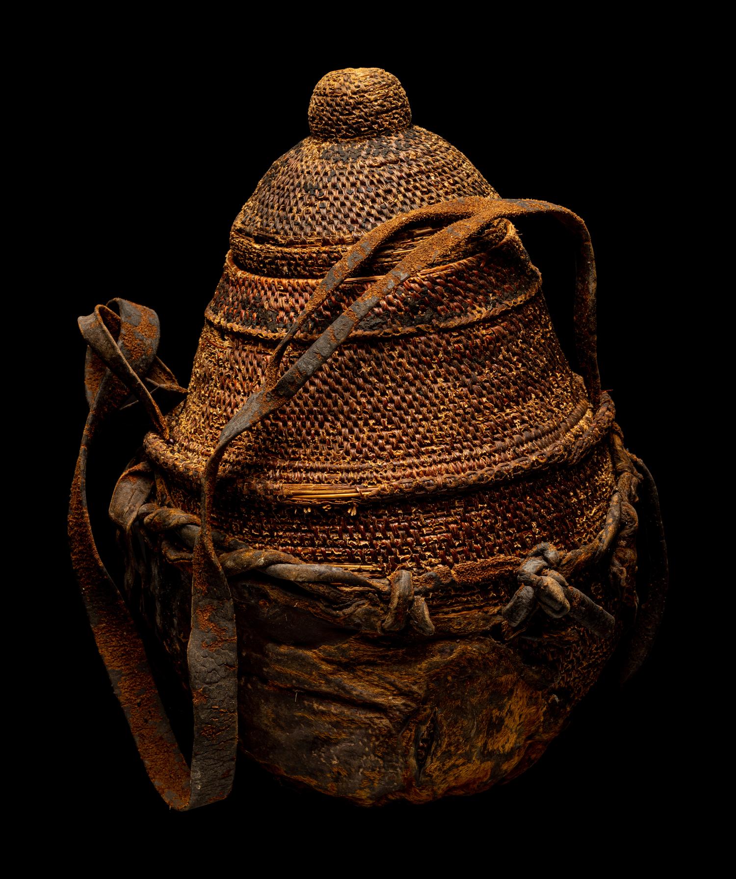 Eleven Oceanic and African Drums, Baskets, and Tools