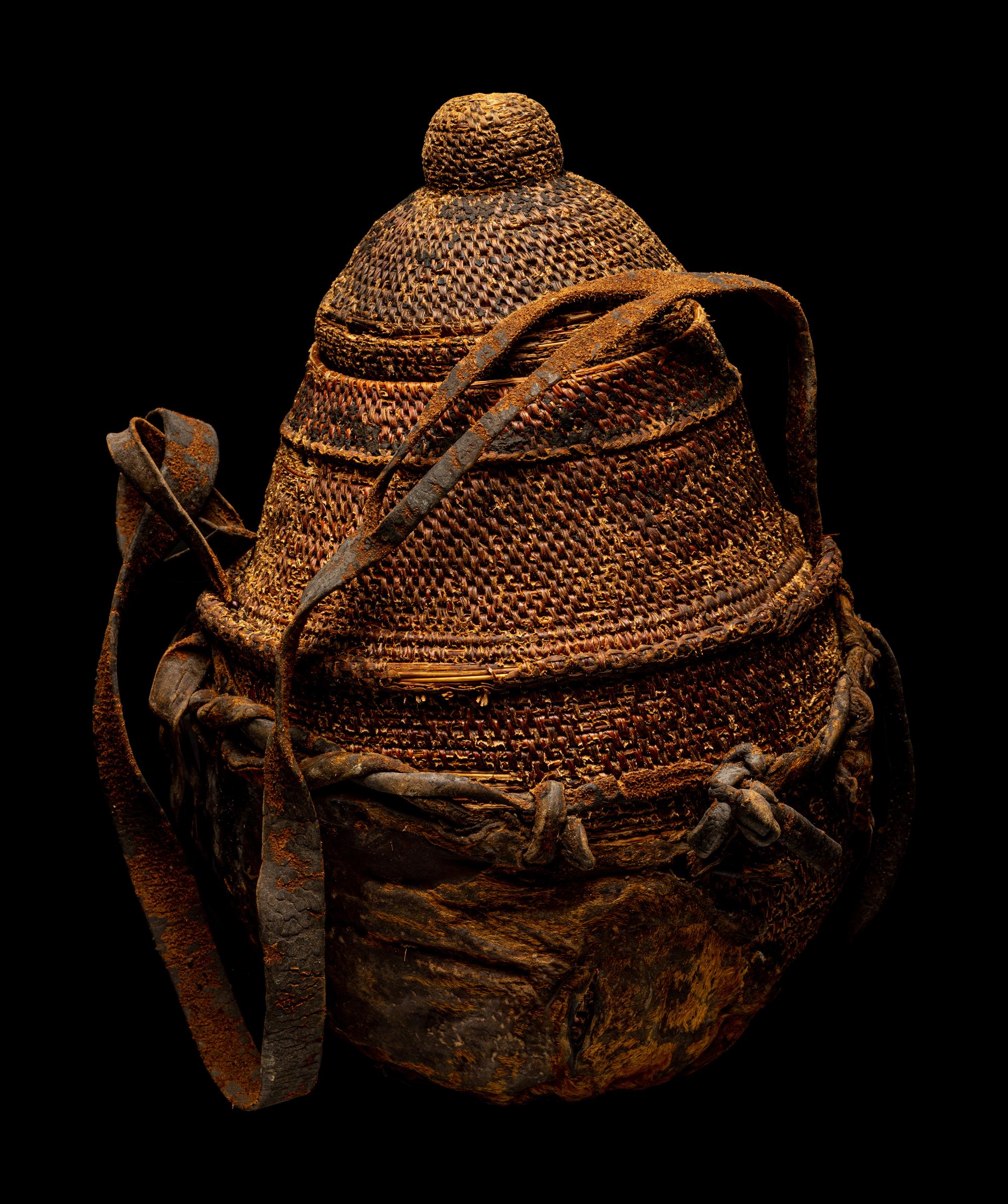 Eleven Oceanic and African Drums, Baskets, and Tools