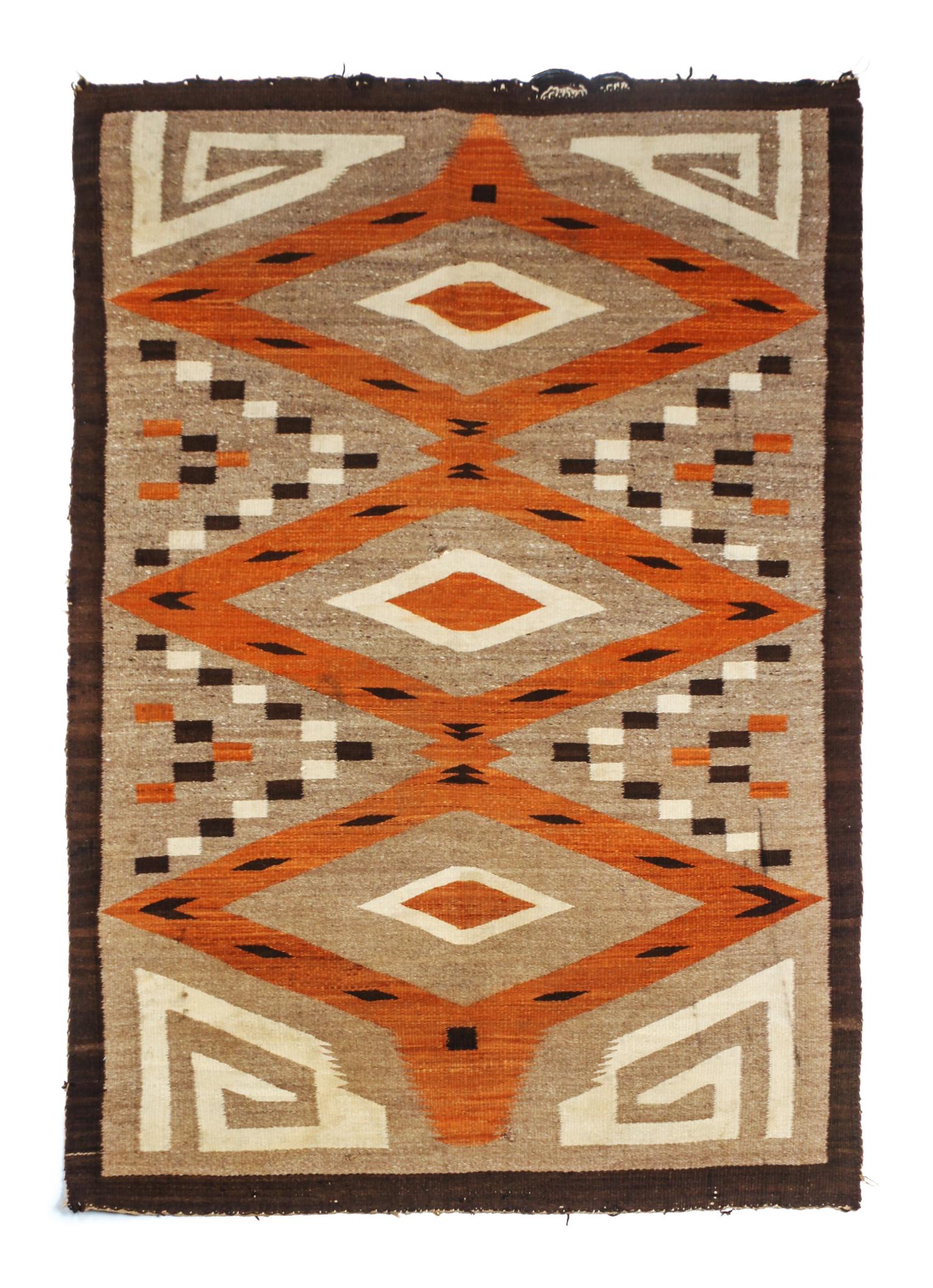 Three Navajo Rugs First: 69 x 54 inches. — CIRCA 1900