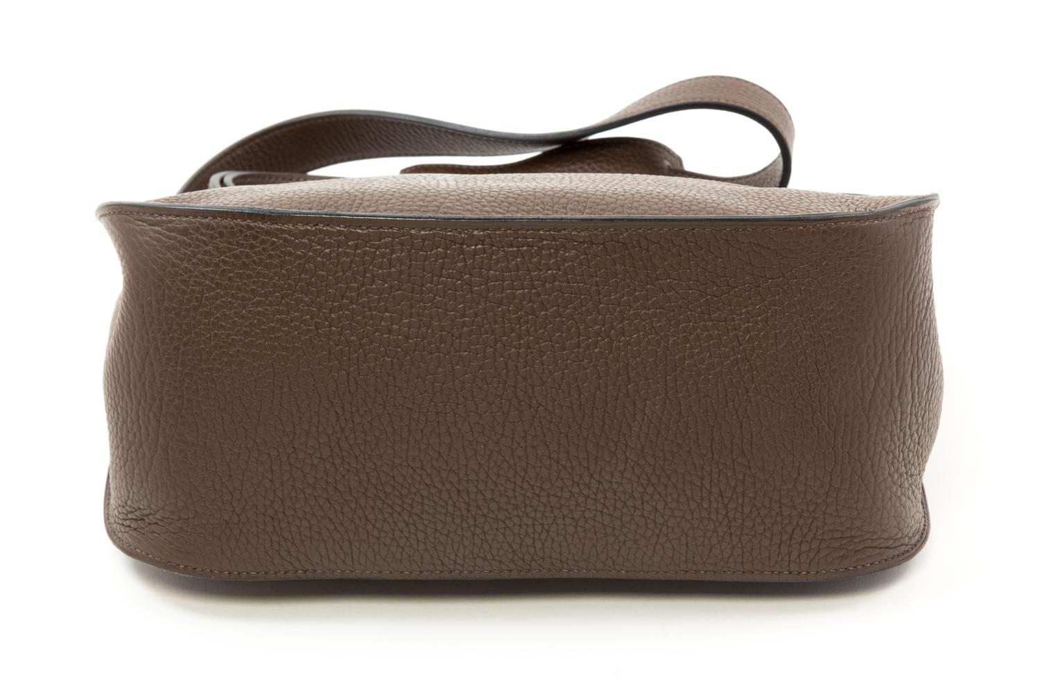 An Hermès Chocolate Taurillon Clemence Jypsiere 28cm Bag, 11" x 8.5" x 5".