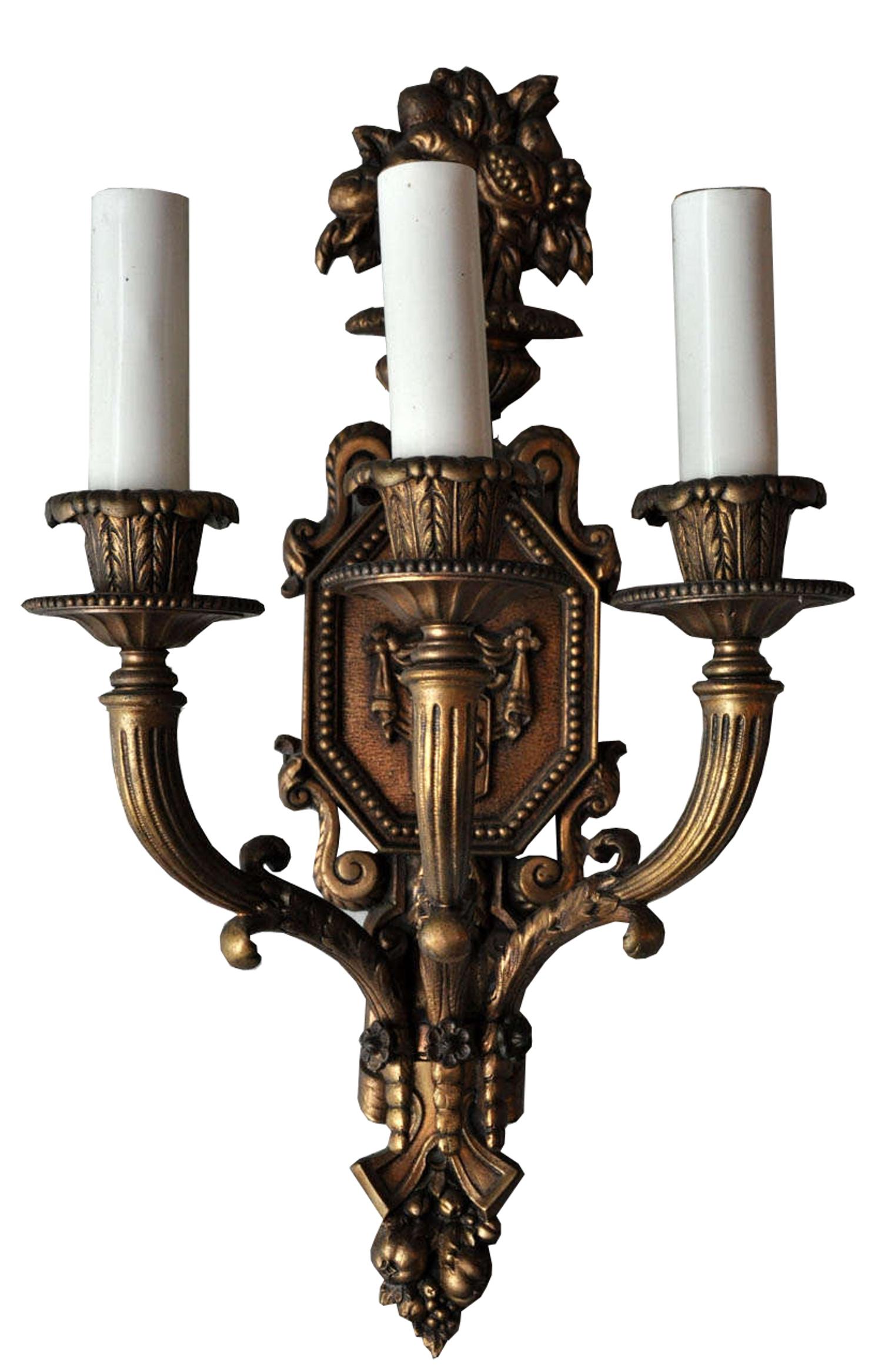 A Pair of Bronze Three-Arm Sconces 11" W x 7" D x 18" H — United States, Circa 1920