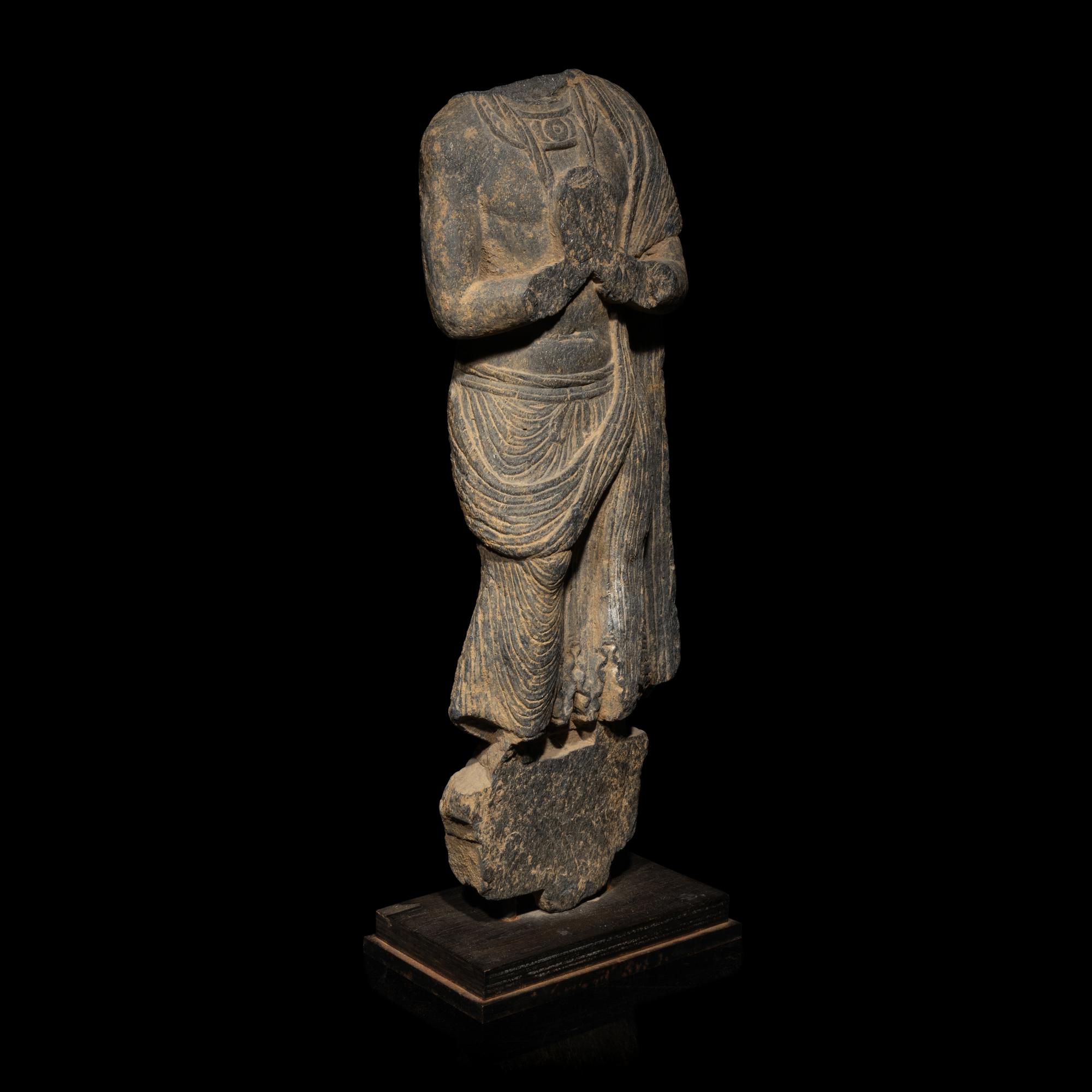 A Gandharan Grey Schist Torso of a Standing Bodhisattva, 3rd-5th Century