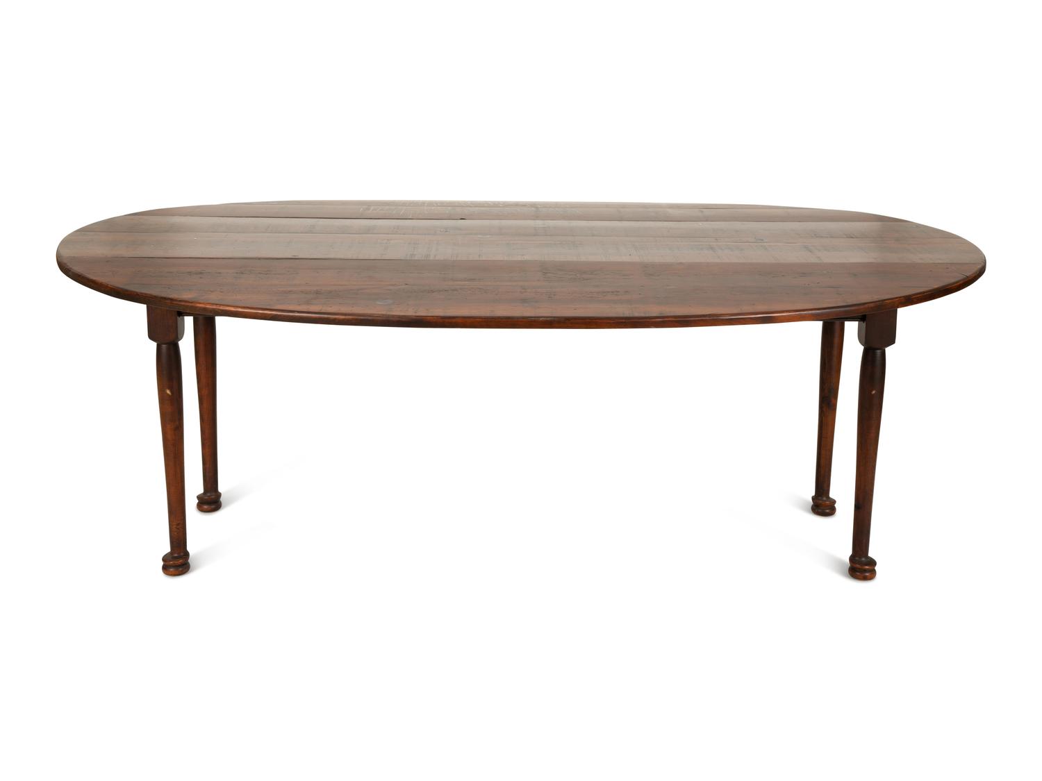 A Queen Anne Style Stained Pine Drop Leaf Gate Leg Dining Table — 20th Century