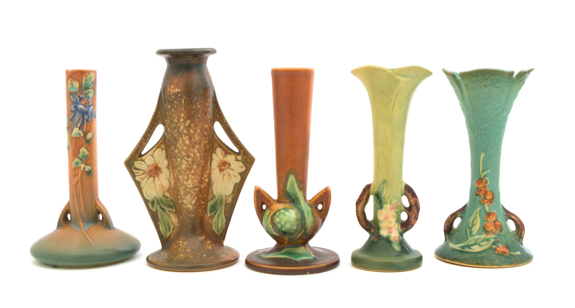 Five Roseville Pottery Bud Vases Height of tallest 8 inches.
