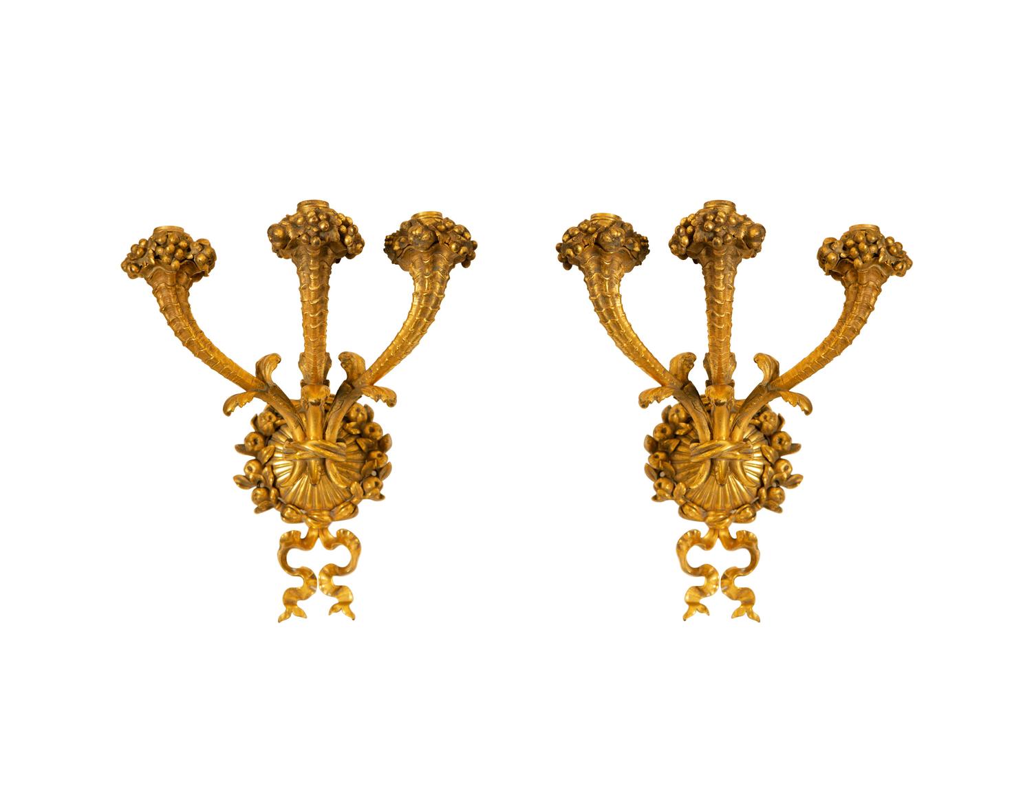 A Pair of French Gilt Bronze Three-Light Sconces