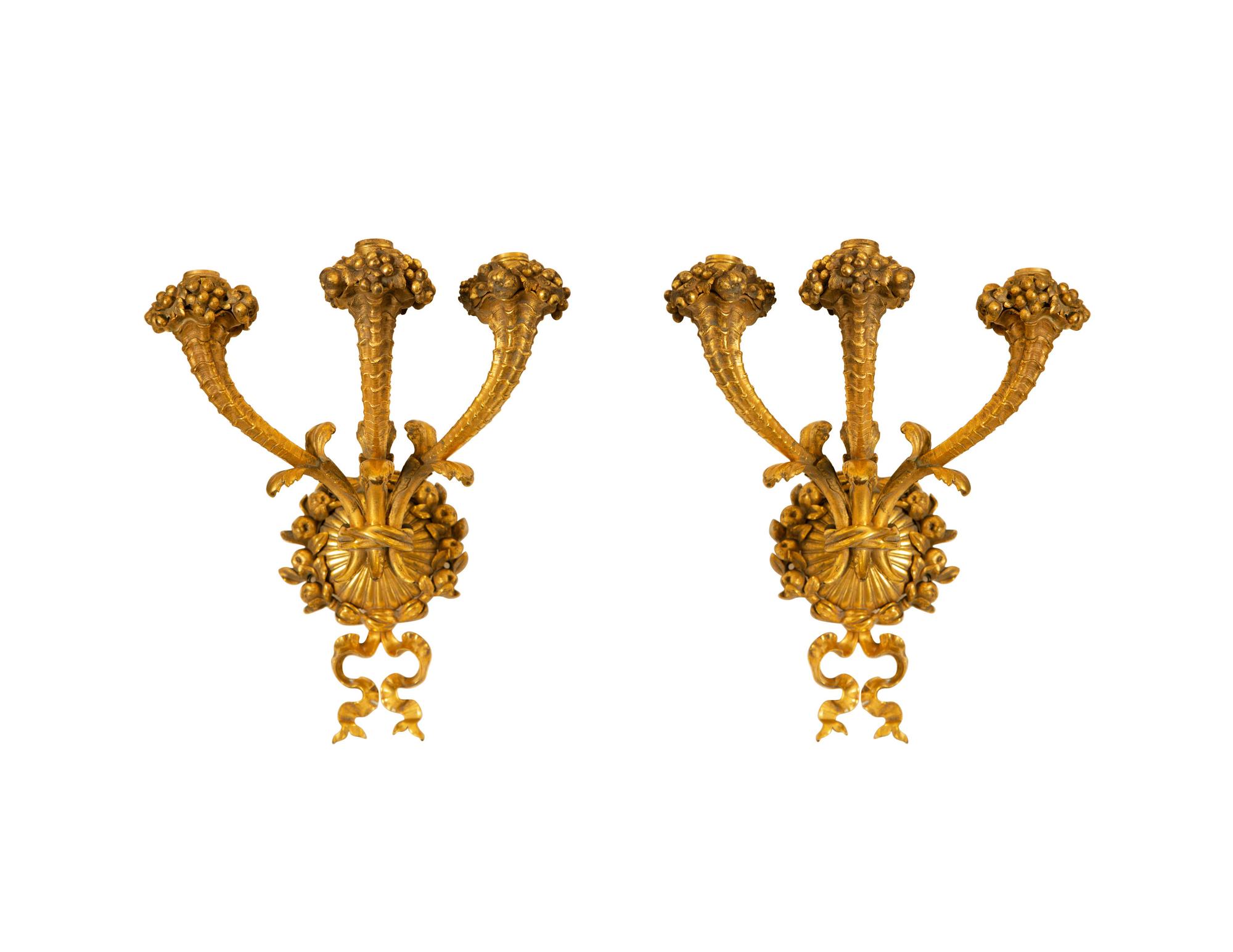 A Pair of French Gilt Bronze Three-Light Sconces