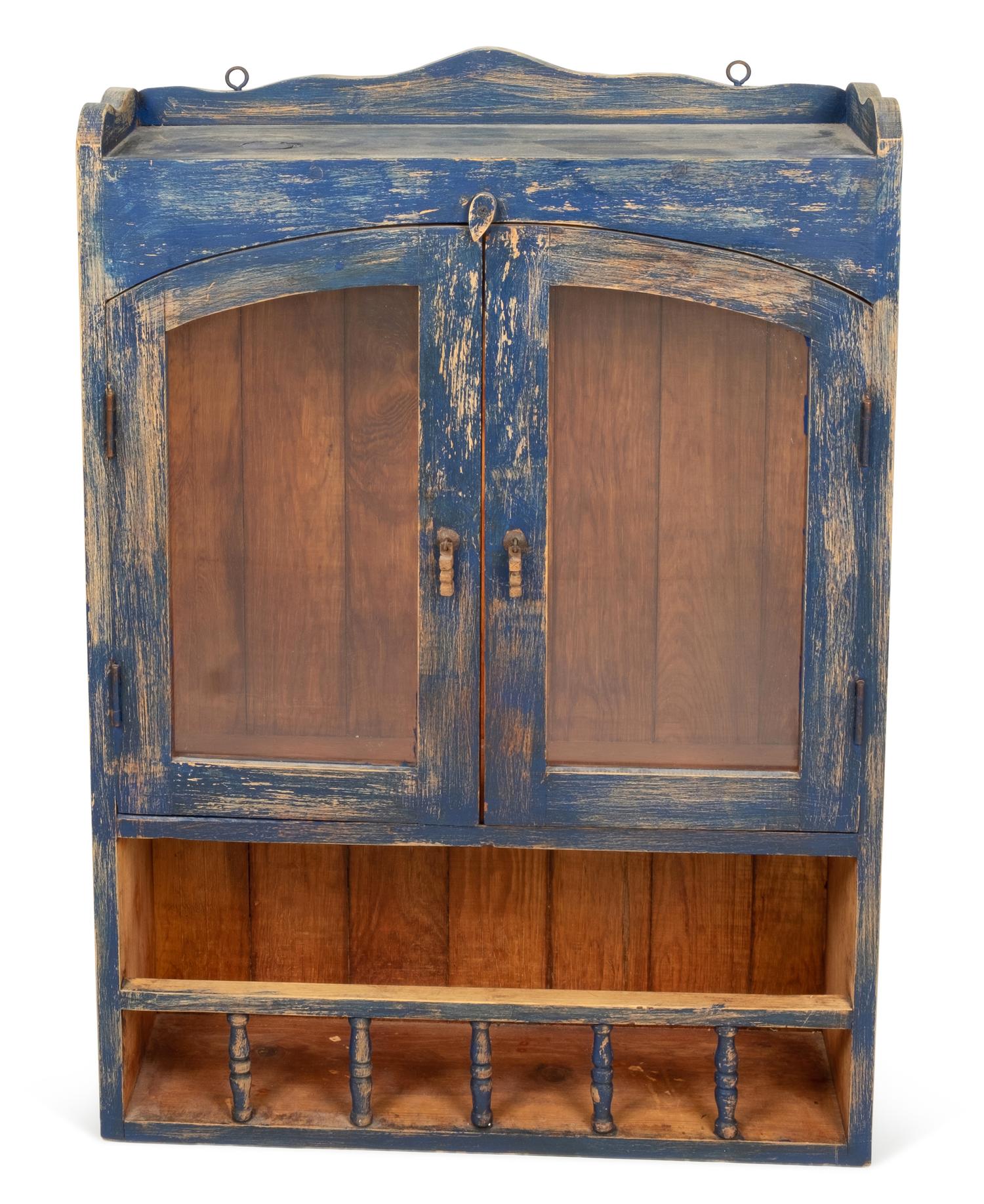A Rustic Hanging Cabinet in Old Blue Paint