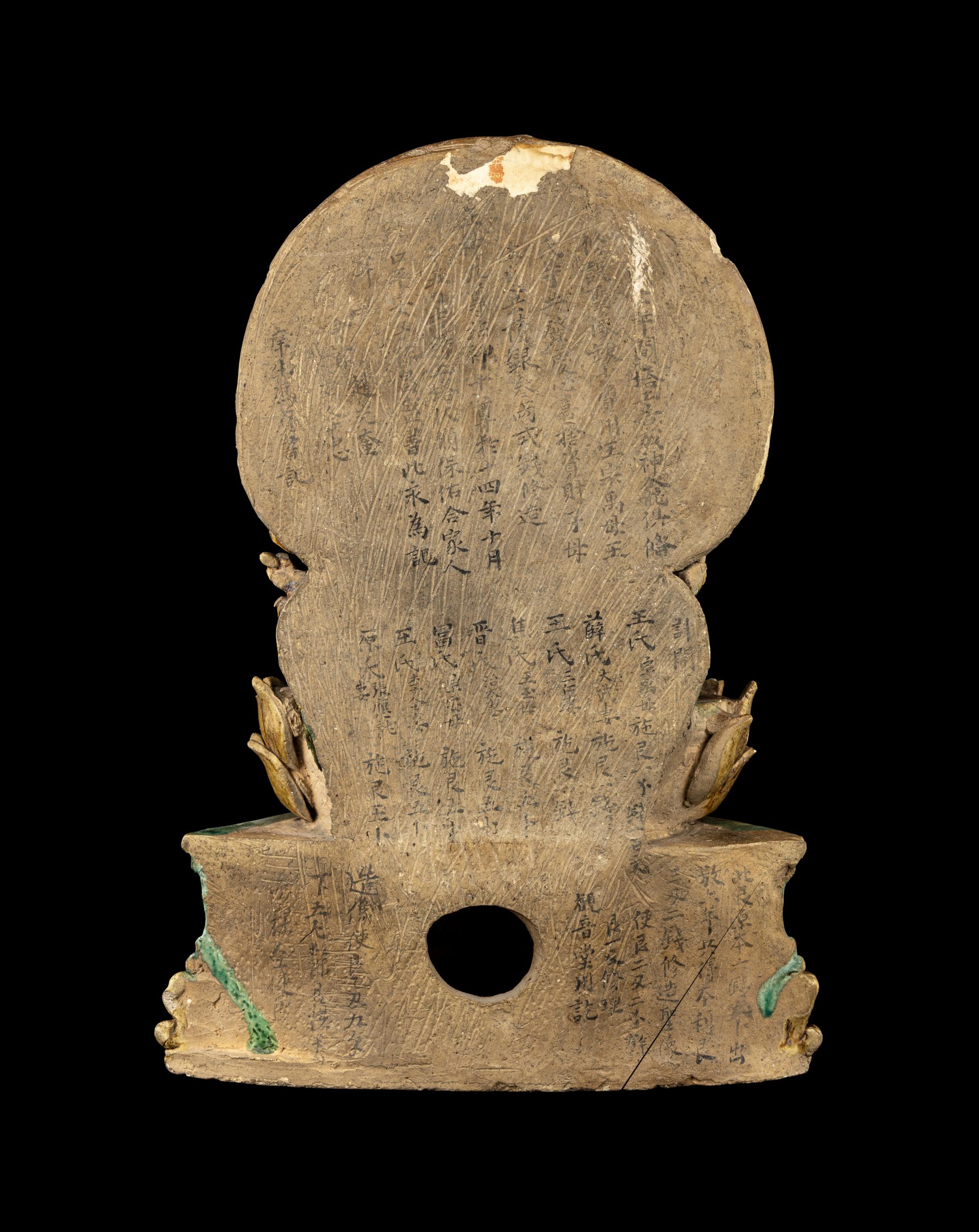 A Chinese Sancai Glazed Stoneware Figure of Seated Guanyin