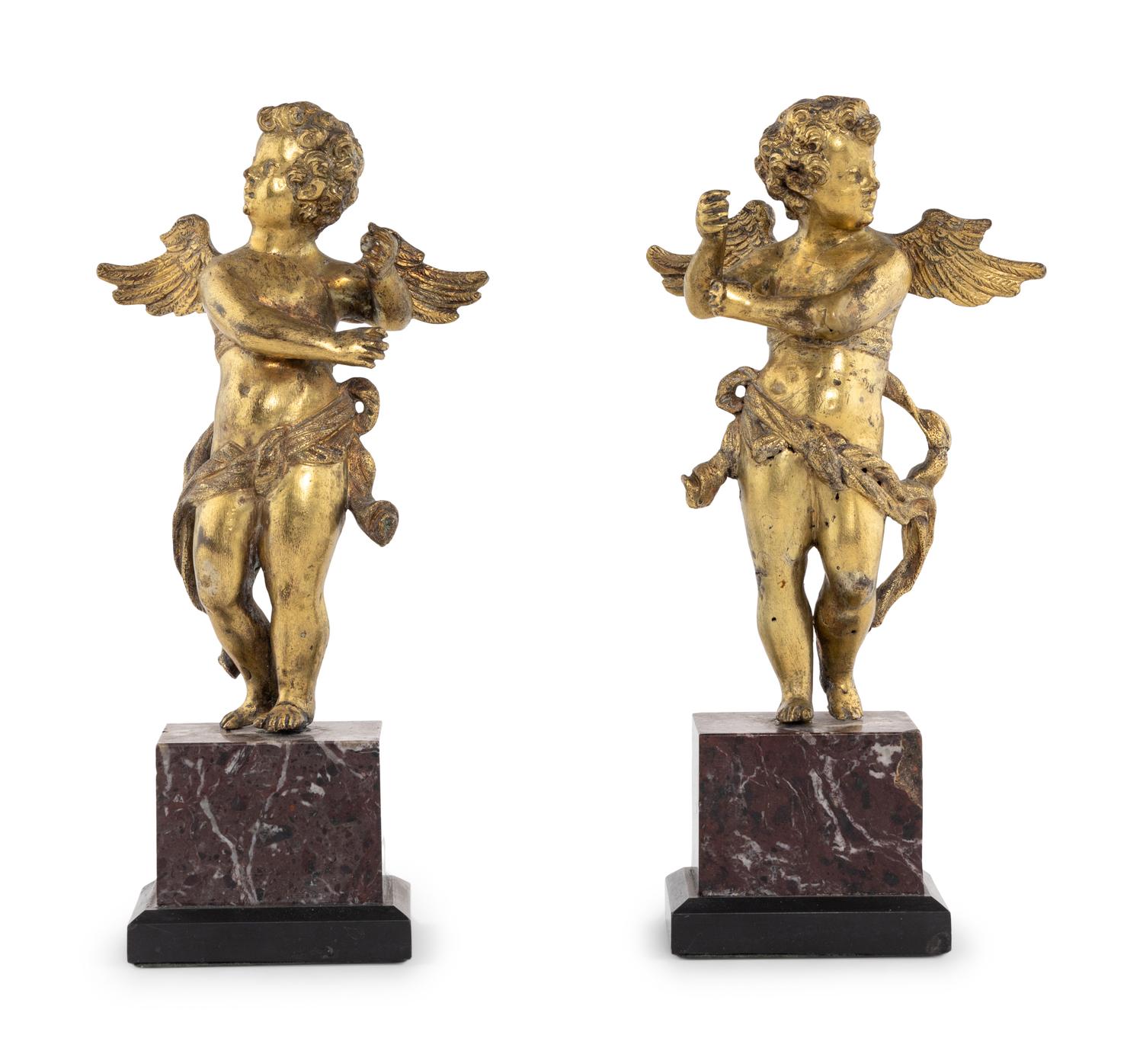 A Pair of Continental Gilt Bronze Figures of Putti