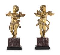 A Pair of Continental Gilt Bronze Figures of Putti