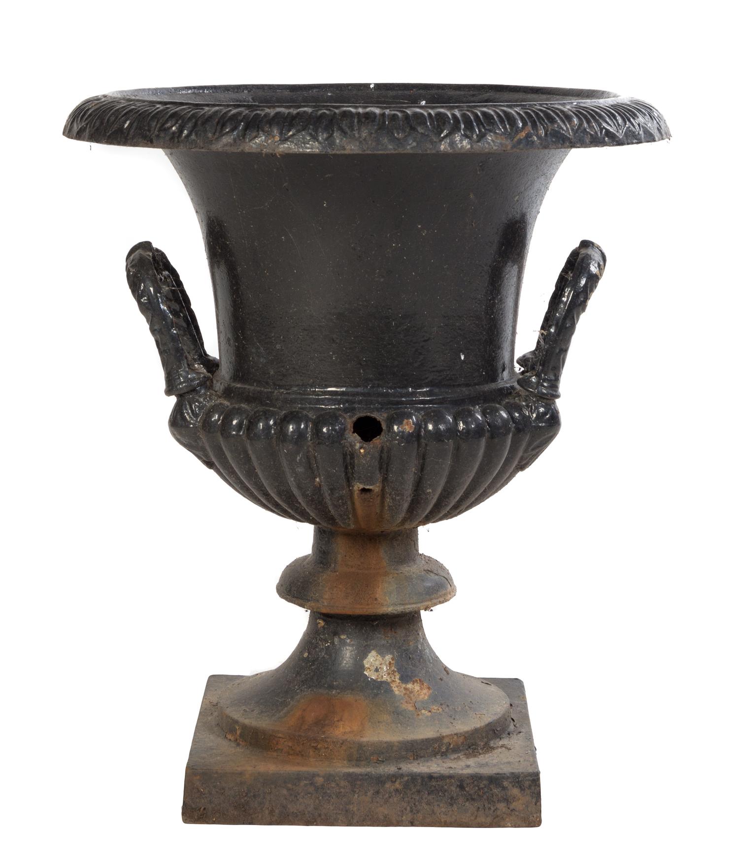 A Victorian Painted Iron Garden Urn Height 27 1/4 inches.
