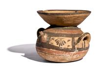 A Daunian Painted Terracotta Funnel Krater