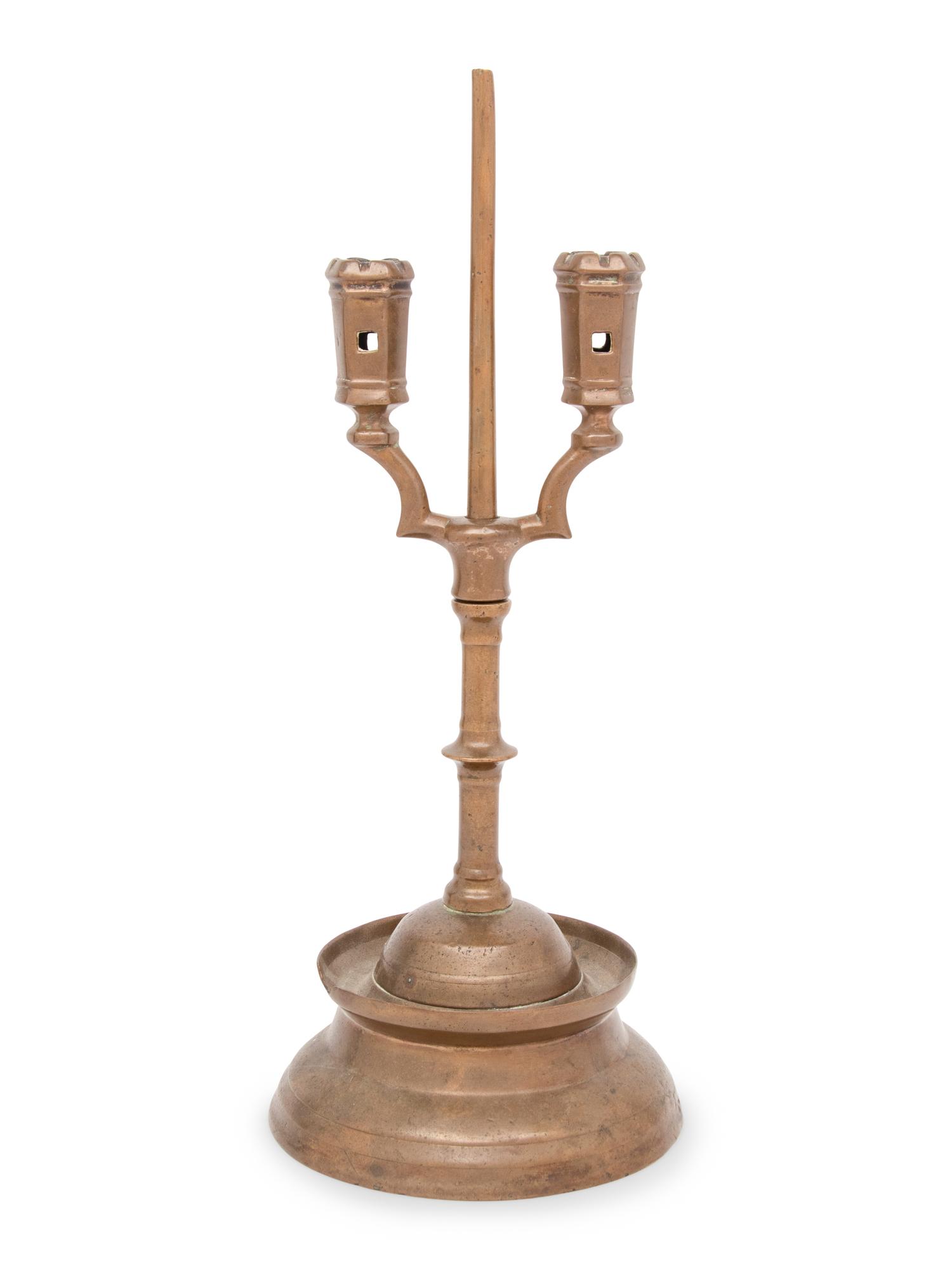 A Southern German Three Kings Two-Light Candlestick
