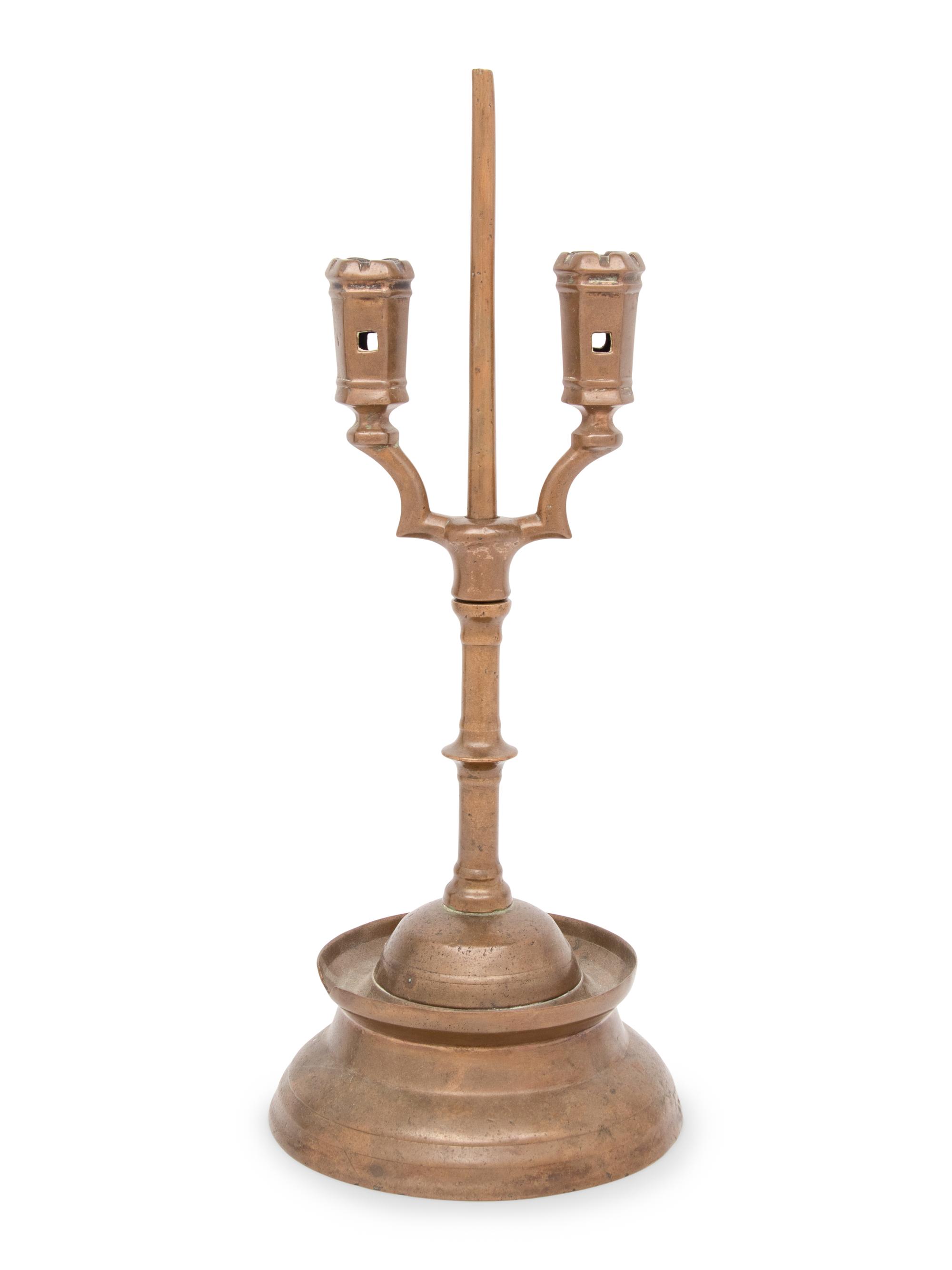A Southern German Three Kings Two-Light Candlestick