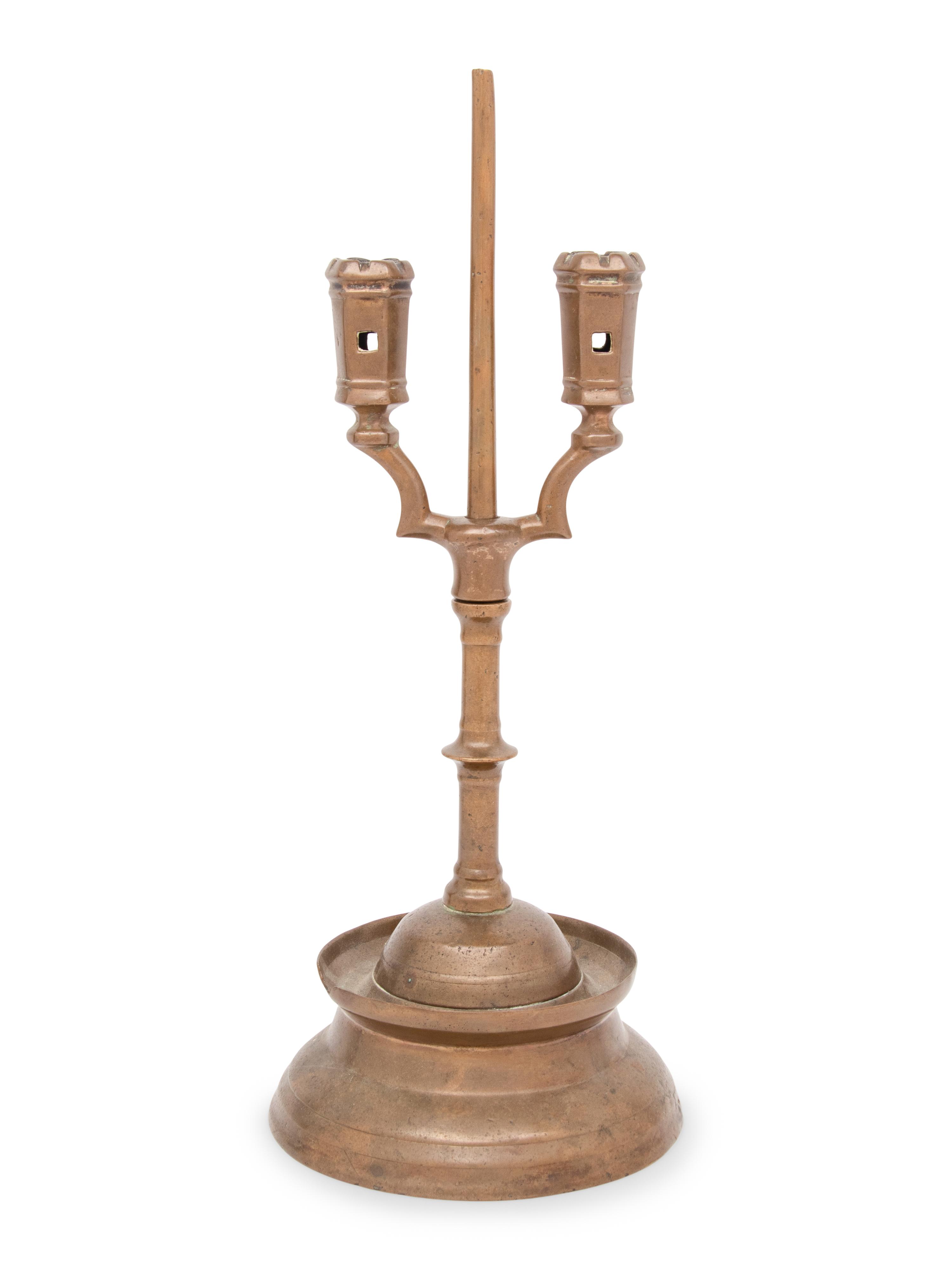 A Southern German Three Kings Two-Light Candlestick