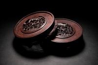 A Pair of Chinese Carved Hardwood Circular Stands