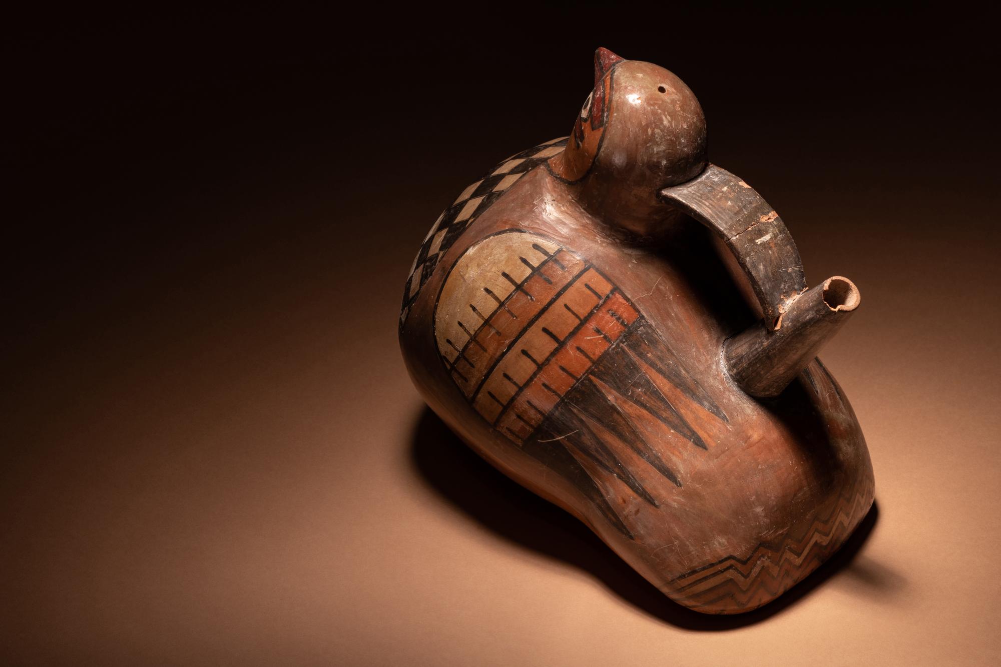 A Nazca Polychrome Terracotta Bird Stirrup Vessel