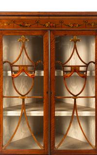 An Edwardian Painted Corner Cabinet