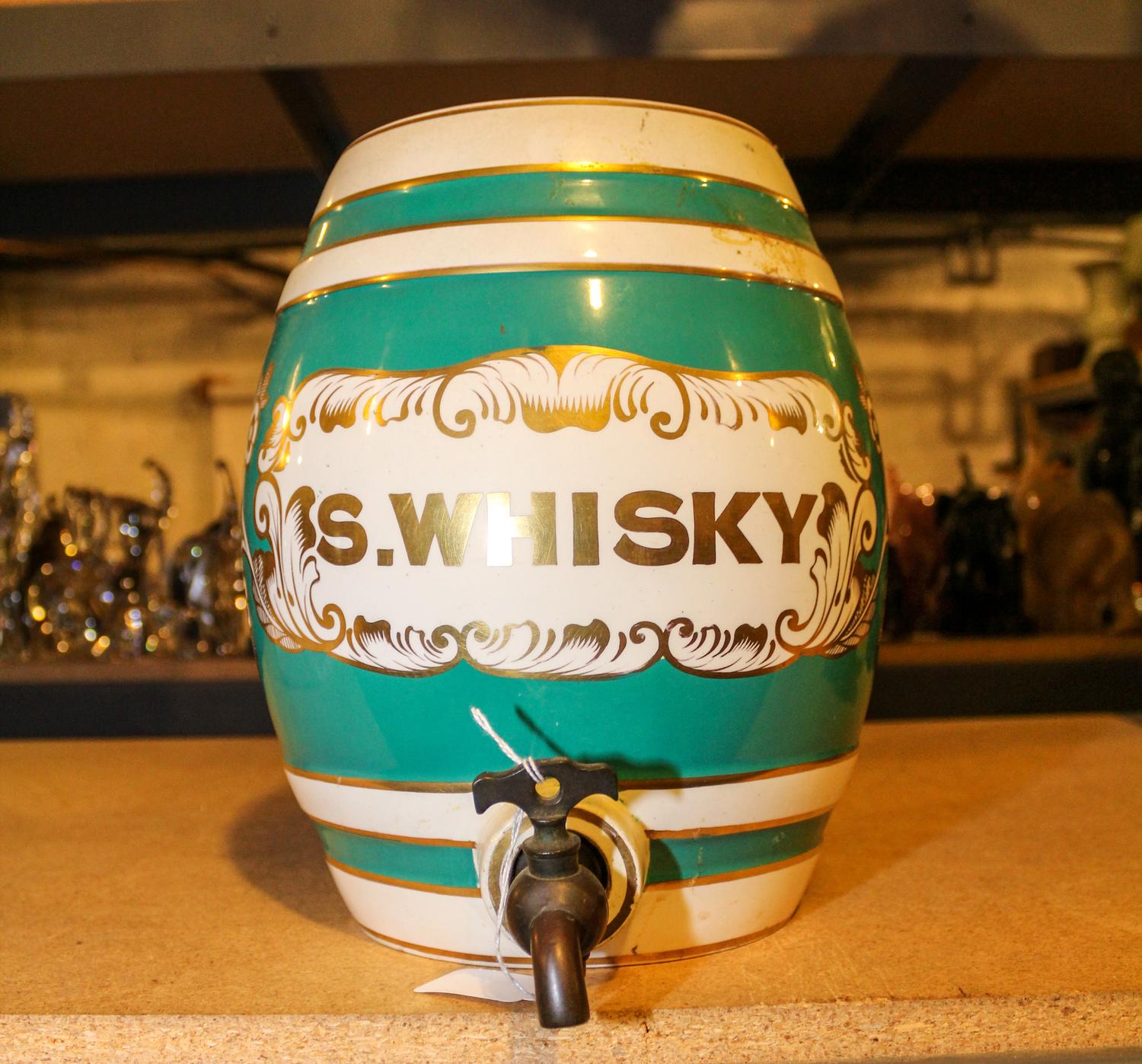 A Ceramic Whiskey Dispenser Height 11 inches. — 19TH CENTURY