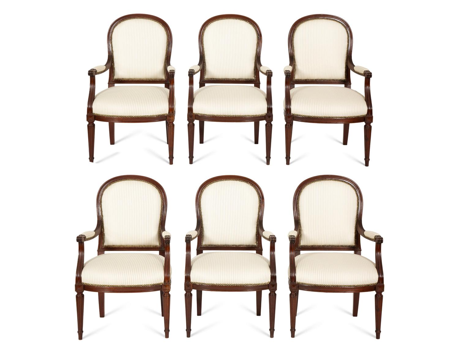 A Set of Six Louis XVI Style Mahogany Dining Armchairs