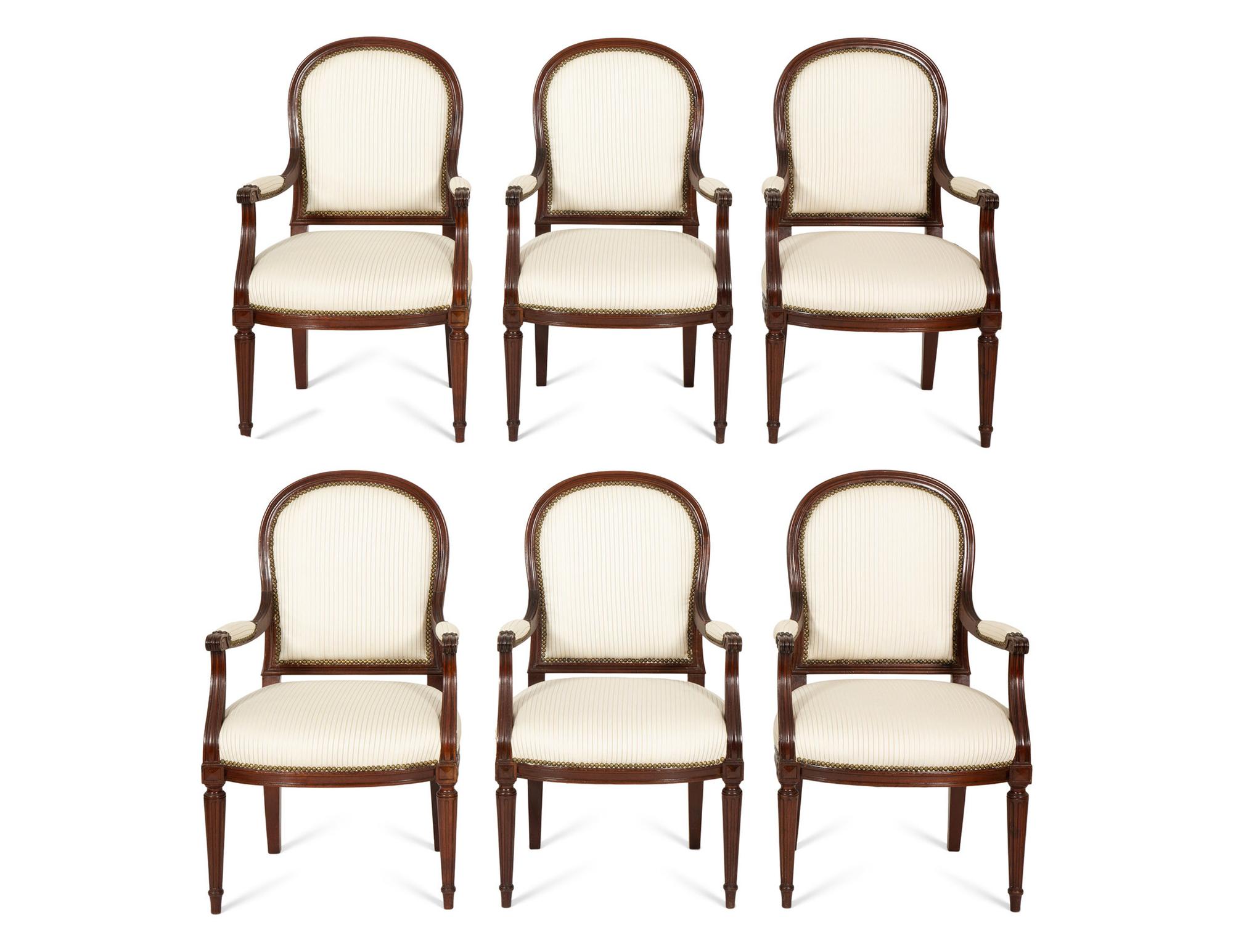 A Set of Six Louis XVI Style Mahogany Dining Armchairs