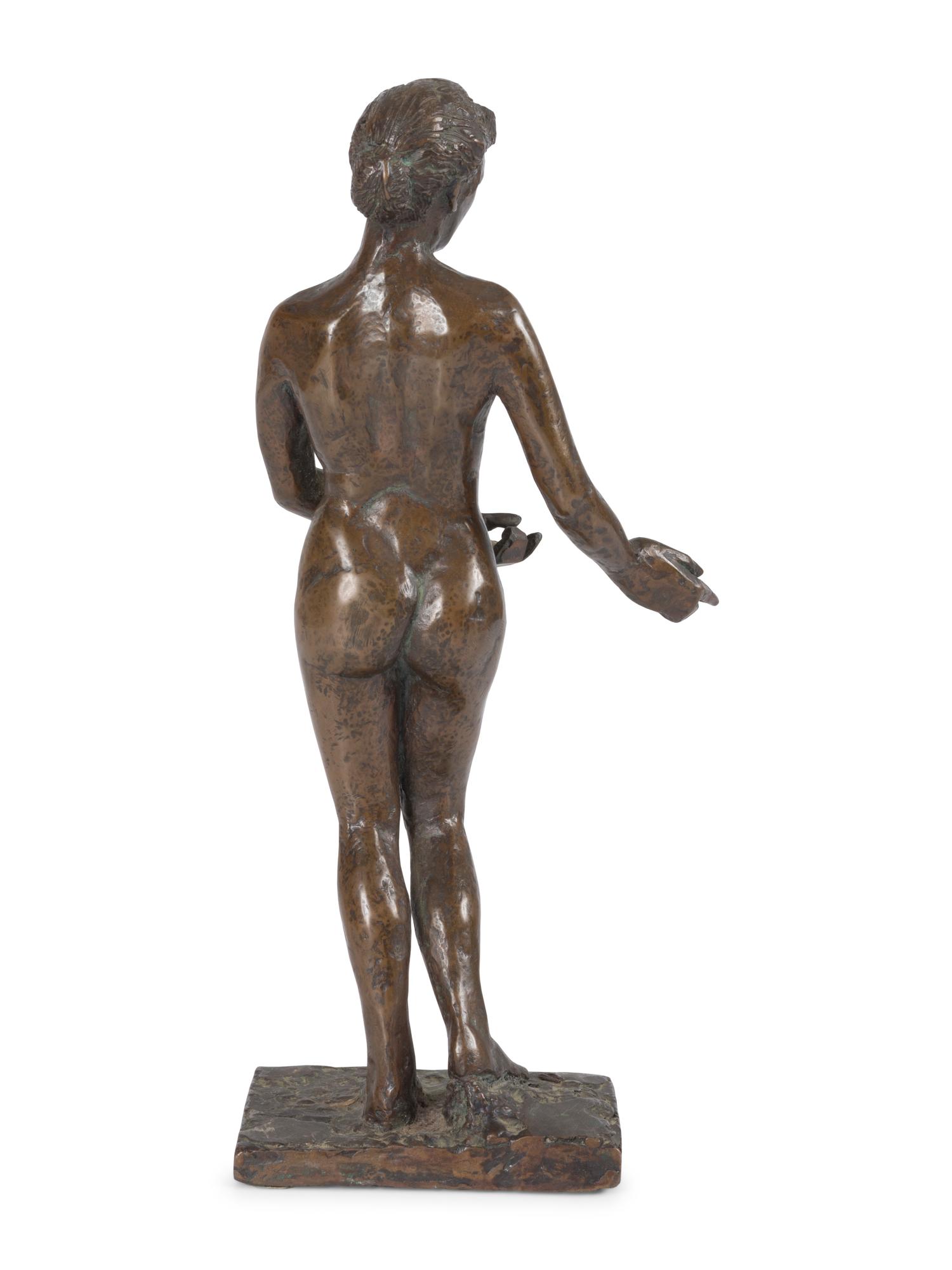 A Bronze Sculpture of a Nude Woman