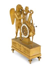An Empire Gilt Bronze Figural Mantel Clock