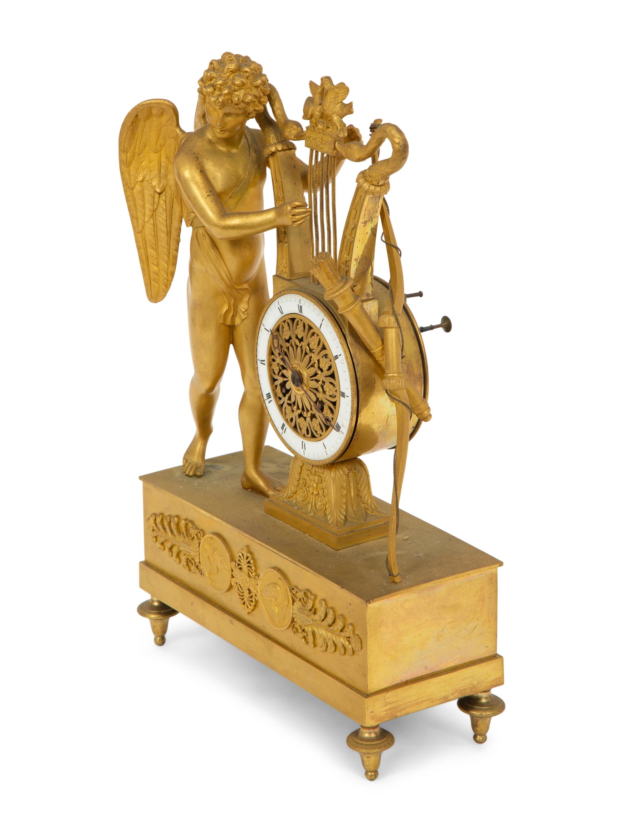 An Empire Gilt Bronze Figural Mantel Clock