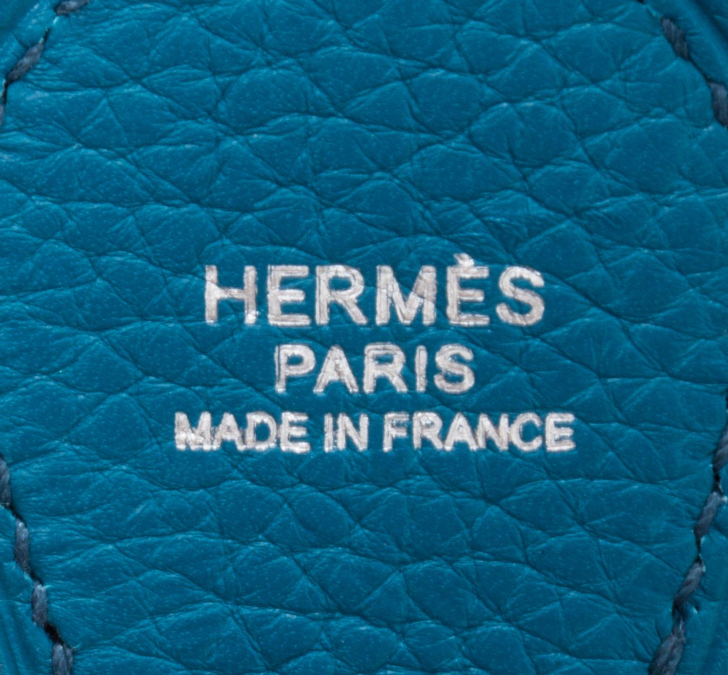 An Hermes Bleu Izmir Taurillon Clemence Evelyne III PM Handbag, 11.25" x 12" x 2.5".