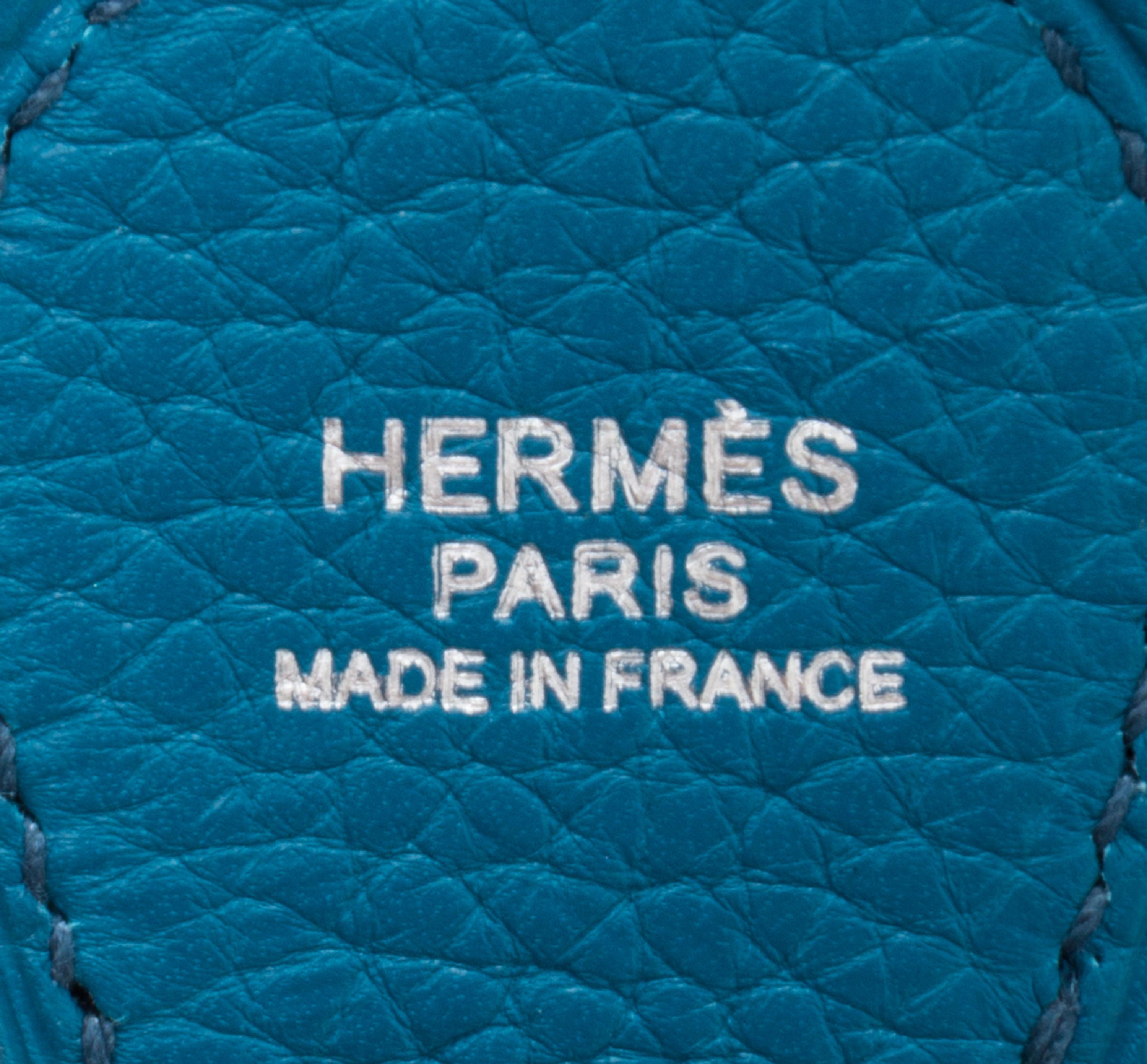 An Hermes Bleu Izmir Taurillon Clemence Evelyne III PM Handbag, 11.25" x 12" x 2.5".