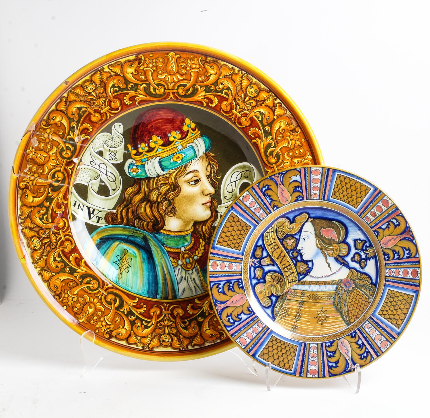 A Collection of Four Polychrome Majolica Chargers Diameter of largest 22 inches.