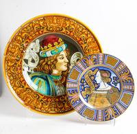 A Collection of Four Polychrome Majolica Chargers Diameter of largest 22 inches.