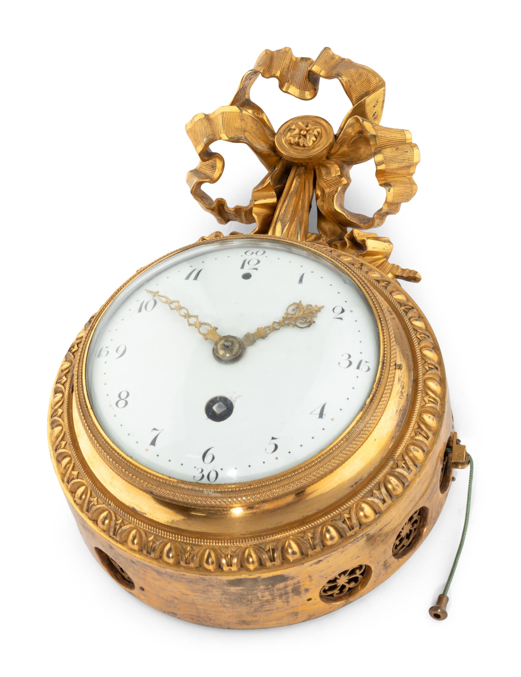 A French Gilt Bronze Wall Clock