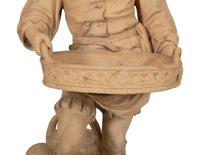 A Terra Cotta Figural Jardinière