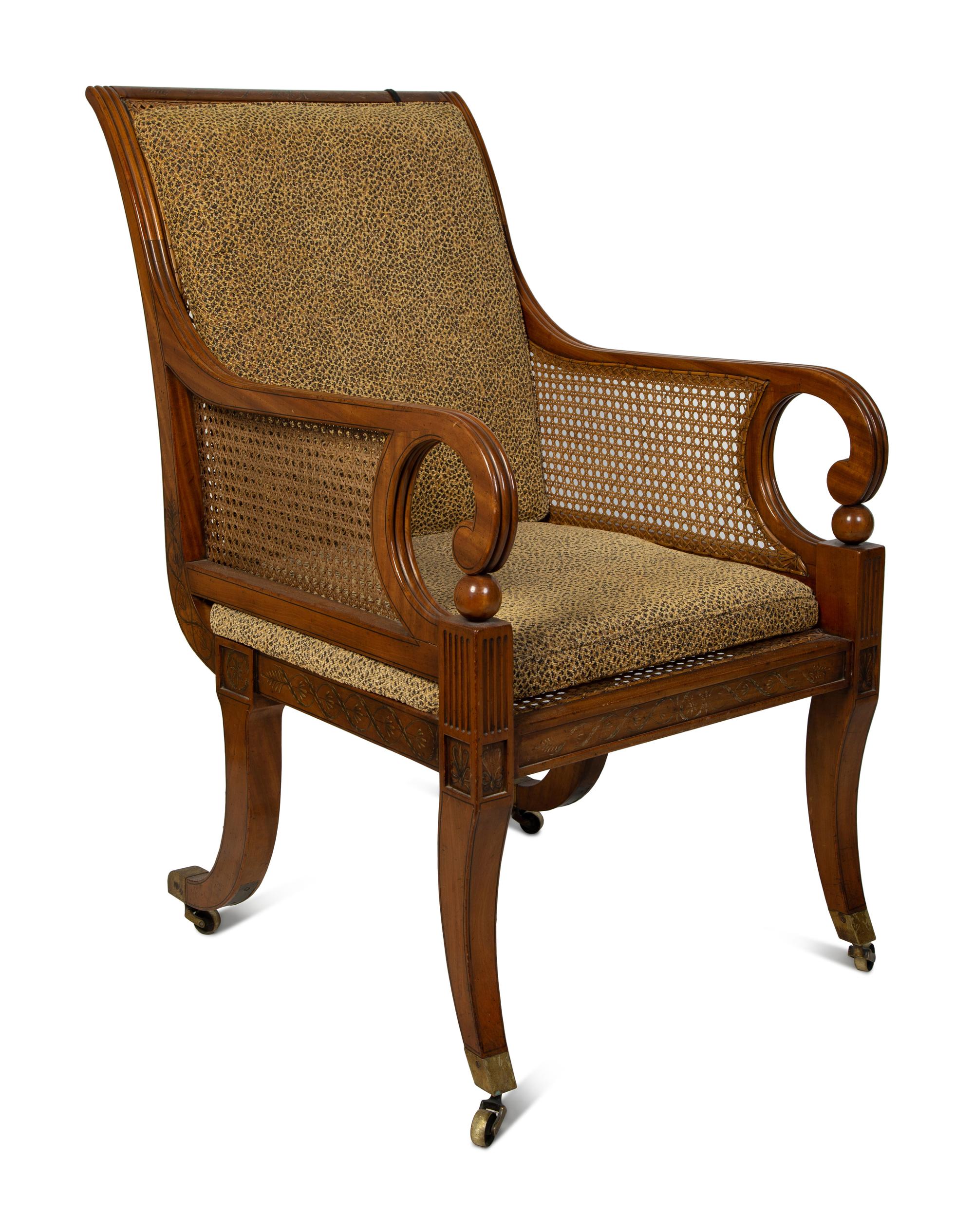 A Regency Style Painted Satinwood Library Chair — 20TH CENTURY