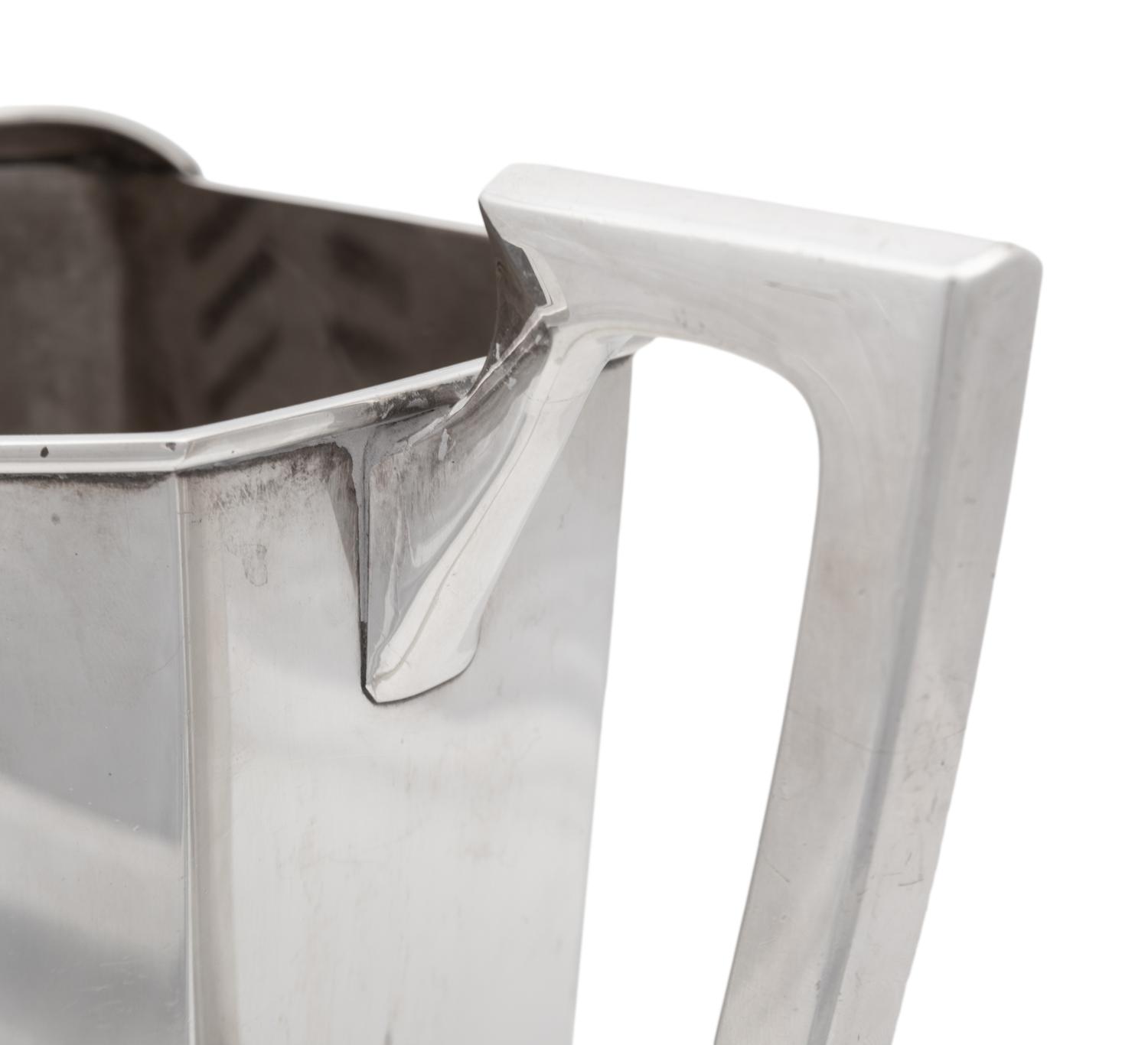 A Japanese Silver Water Pitcher