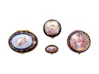 Four Sèvres Style Painted and Parcel Gilt Porcelain Boxes