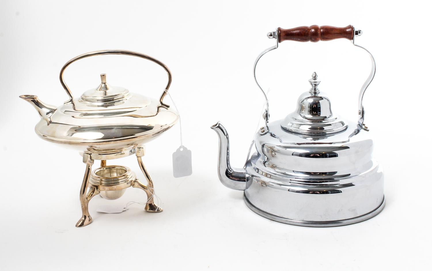 Two Stainless Steel Tea Kettles Height of taller 9 3/4 inches.
