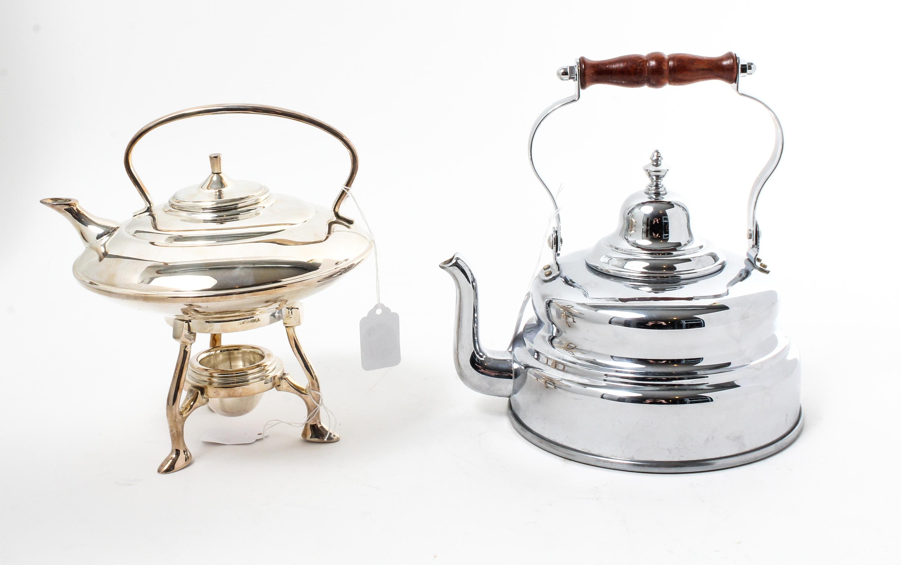 Two Stainless Steel Tea Kettles Height of taller 9 3/4 inches.
