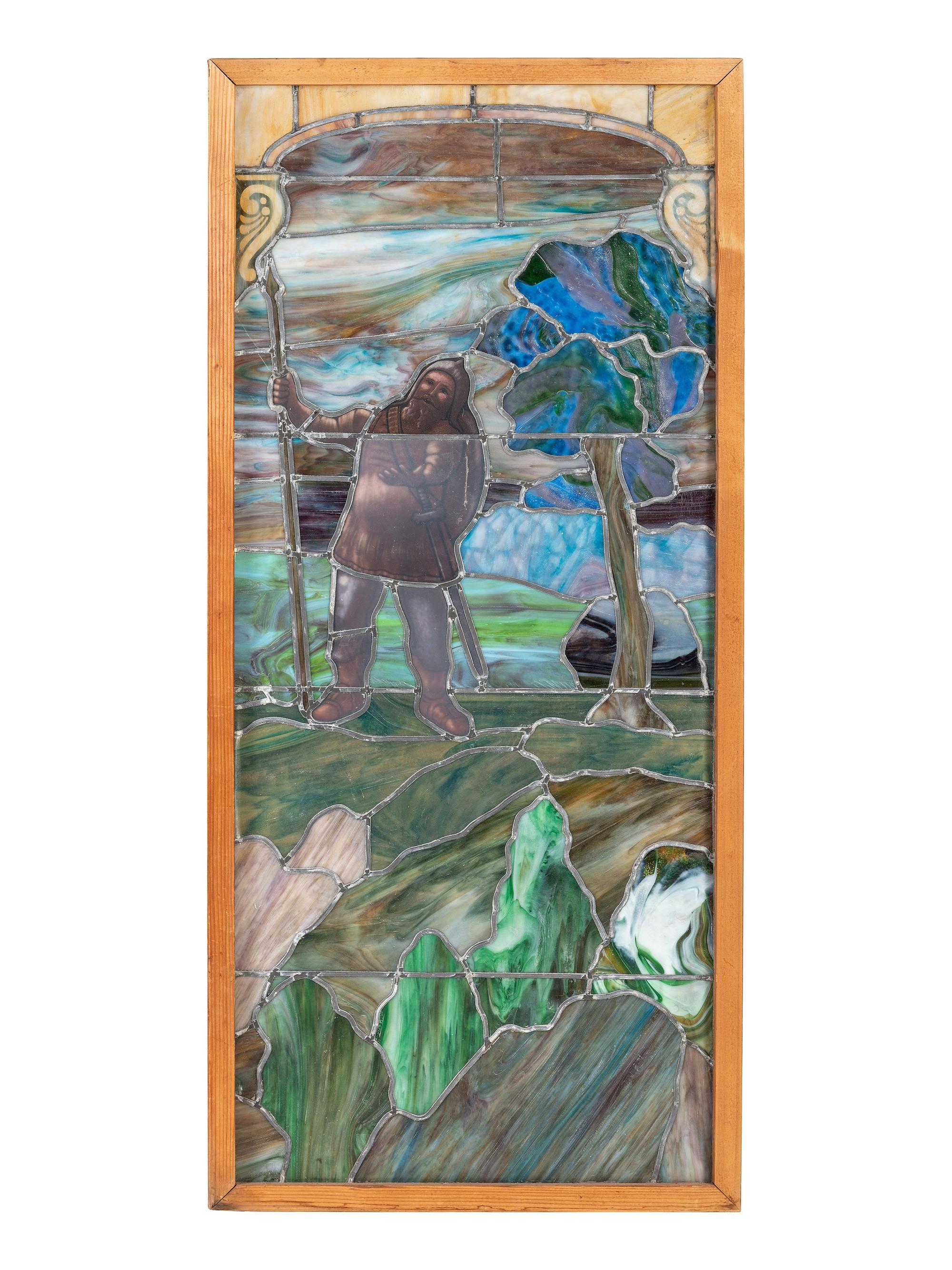 A Pair of Stained and Painted Glass Panels